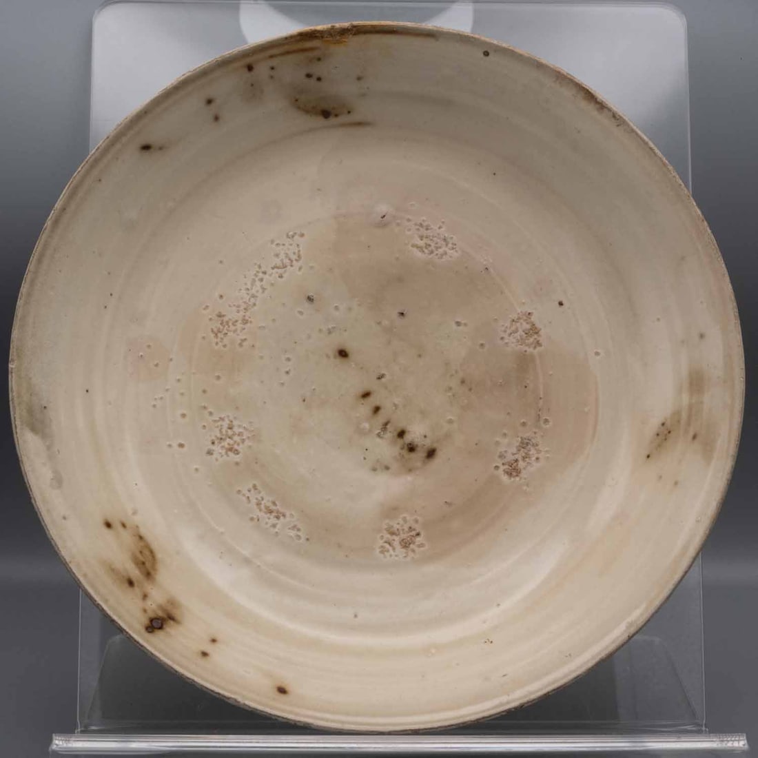 Chinese Song-Yuan Dynasty Longquan Ash Glazed Stoneware Plate: Medium: Longquan Ash Glazed Stoneware Size: 9x9x2x inches Age/Detail: Chinese Song-Yuan Dynasty Condition: great overall, Scratches, check photo for condition reference. Provenance: Collection from Es