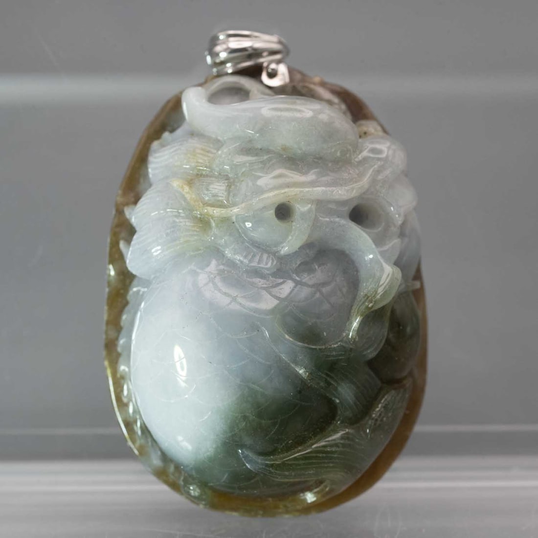 14k White Gold Latch Natural Multi Color Jadeite Dragon Pendant: Medium: Natural Multi Color Jadeite Size: 2x1.5x0.7 inches Age/Detail: 14k White Gold Latch Condition: great overall, check photo for condition reference. Provenance: Collection from Estate in William