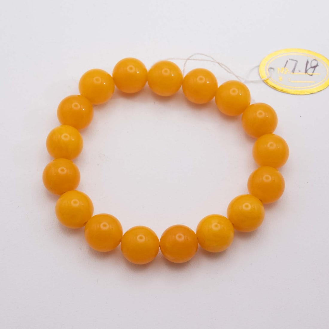 Vintage Natural Amber Mila Bead Bracelet: Medium: Amber Mila Size: 12mm Age/Detail: Vintage Natural Condition: great overall, check photo for condition reference. Provenance: Collection from Estate in Williamsburg LiveShipping is NOT a part o