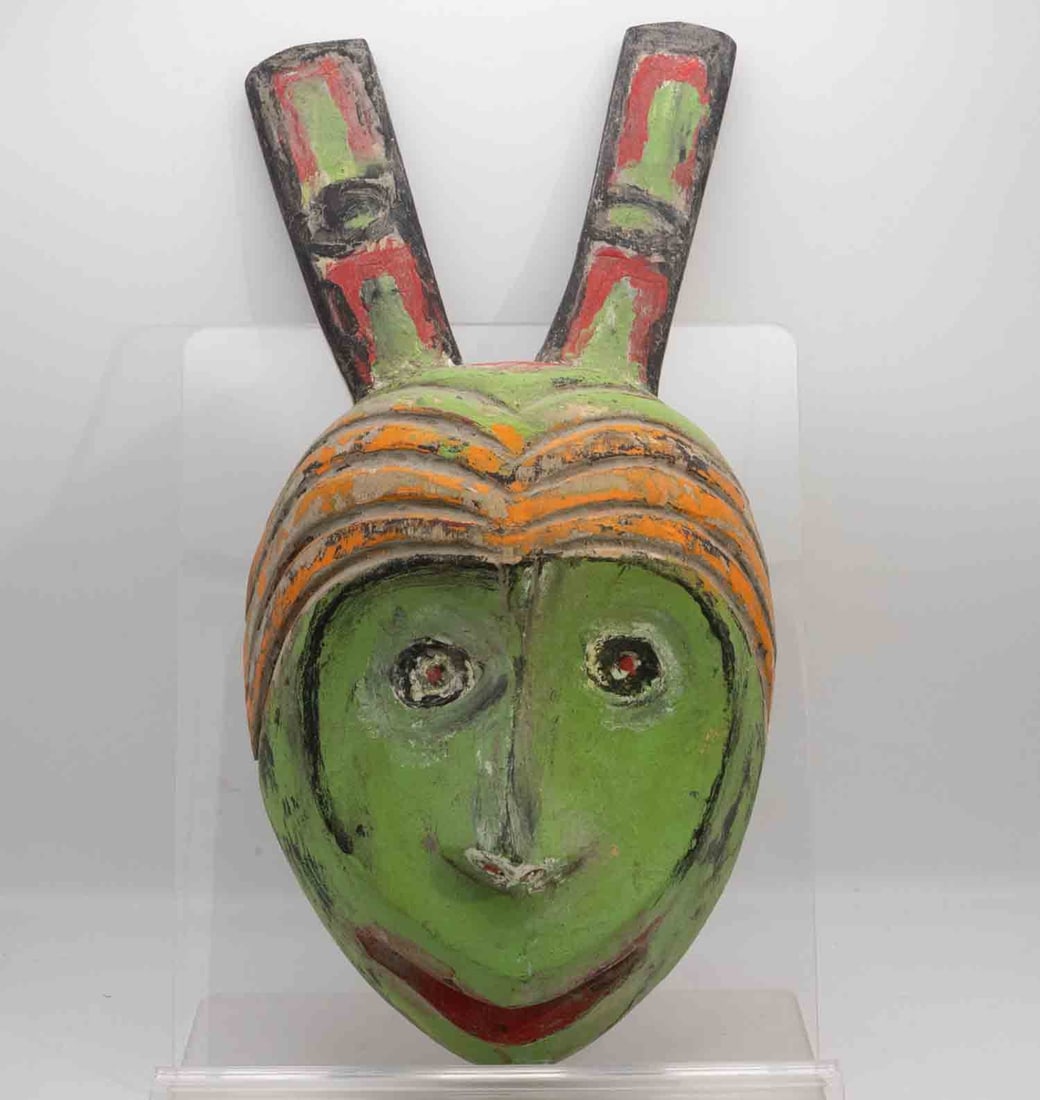 Antique West African Carved Wood Helmet Mask: Medium: Wood Size: 7x3.3x14.5 inches Age/Detail: Antique West African Carved Condition: great overall, check photo for condition reference. Antique West African carved wooden helmet mask with twin hor