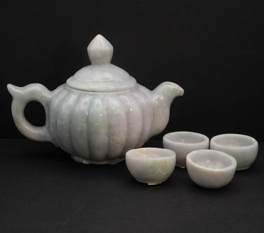 Vintage Chinese Hand Carved Natural Jadeite Teapot And Cups: Medium: Natural Jadeite Size: 7x5x5 inches Age/Detail: Vintage Chinese Hand Carved Condition: great overall, check photo for condition reference. Provenance: Collection from Estate in Williamsburg Liv