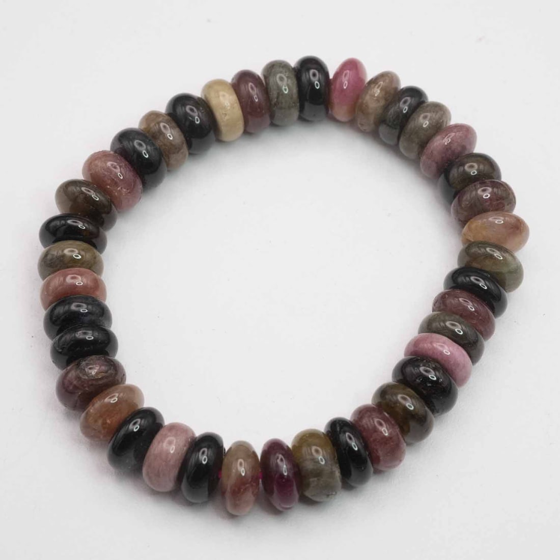 Natural Multi Colored Tourmaline Bead Bracelet: Medium: Multi Colored TourmalineSize: 10x5mmAge/Detail: NaturalCondition: great overall, check photo for condition reference.Provenance:Collection from Estate in WilliamsburgLiveShipping is NOT a part