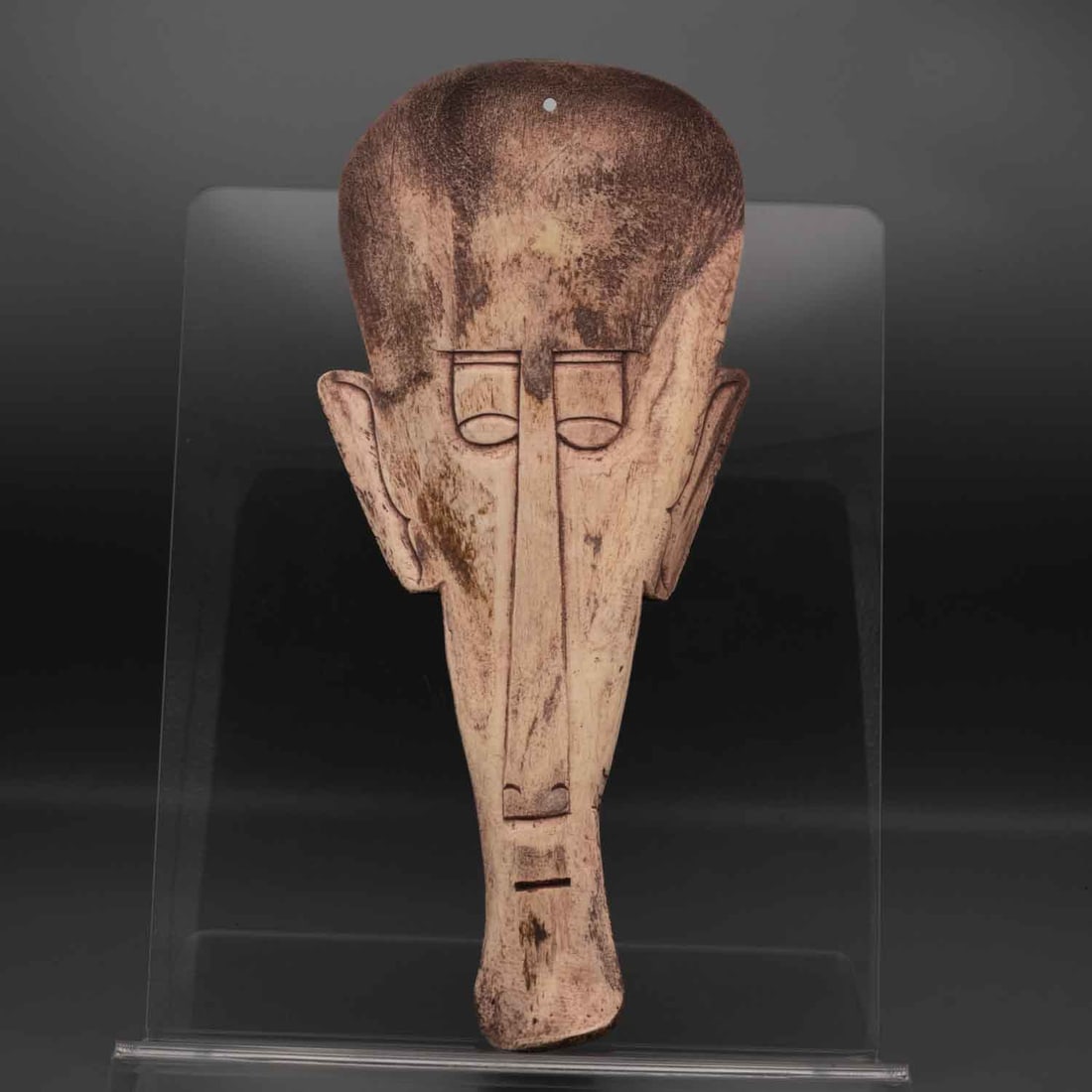 Old African Tribal Wood Mask: Medium: WoodSize: 11.5x5.5x1.5 inchesAge/Detail: Old African TribalCondition: great overall, check photo for condition reference.Provenance:Collection from Estate in WilliamsburgLiveShipping is NOT a