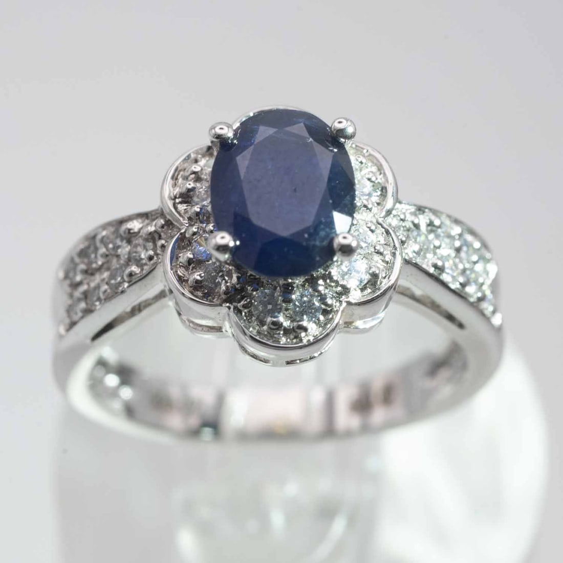 Sterling Silver Blue Cubic Zirconia Ring: Medium: Blue Cubic Zirconia Size: US7, 4gram Age/Detail: Sterling Silver Condition: great overall, check photo for condition reference. Provenance: Collection from Estate in Williamsburg LiveShipping