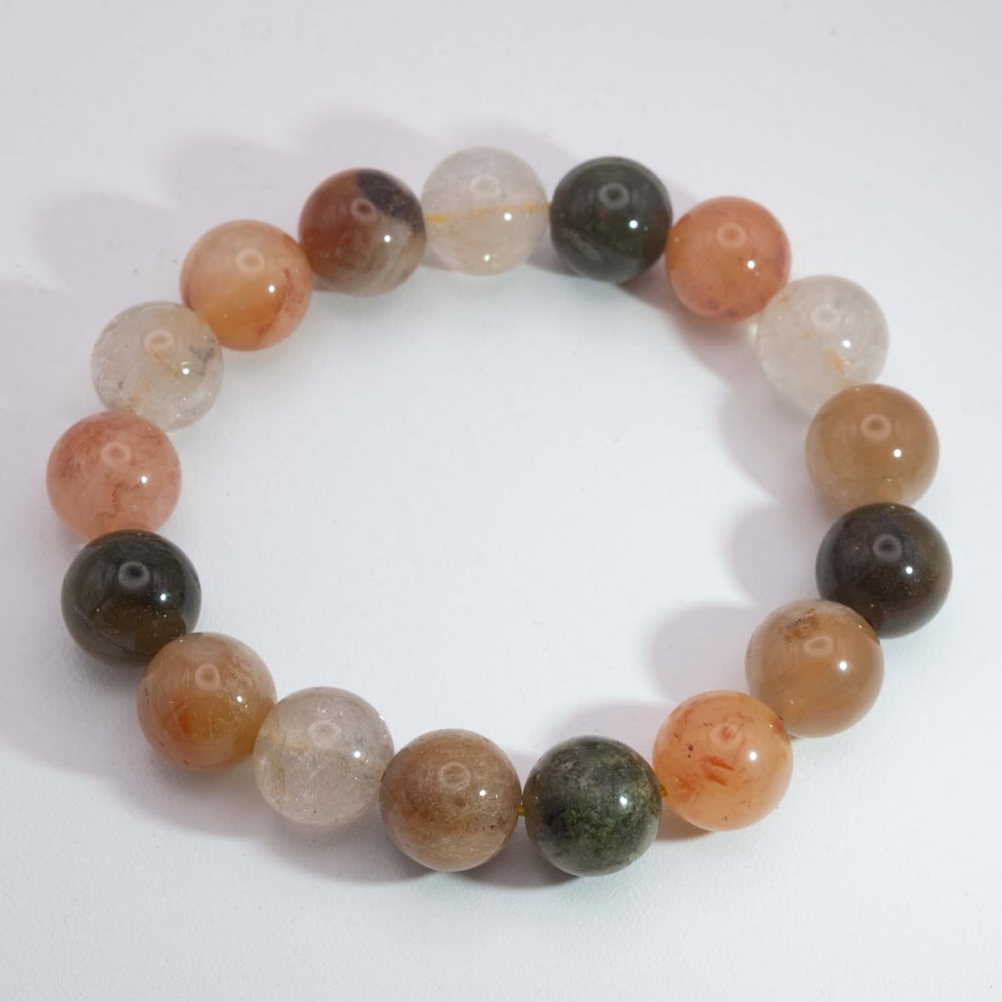 Natural Fire Quartz Bead Bracelet: Medium: Fire Quartz Size: 12mm Age/Detail: Natural Condition: great overall, check photo for condition reference. Provenance: Collection from Estate in Williamsburg LiveShipping is NOT a part of the a
