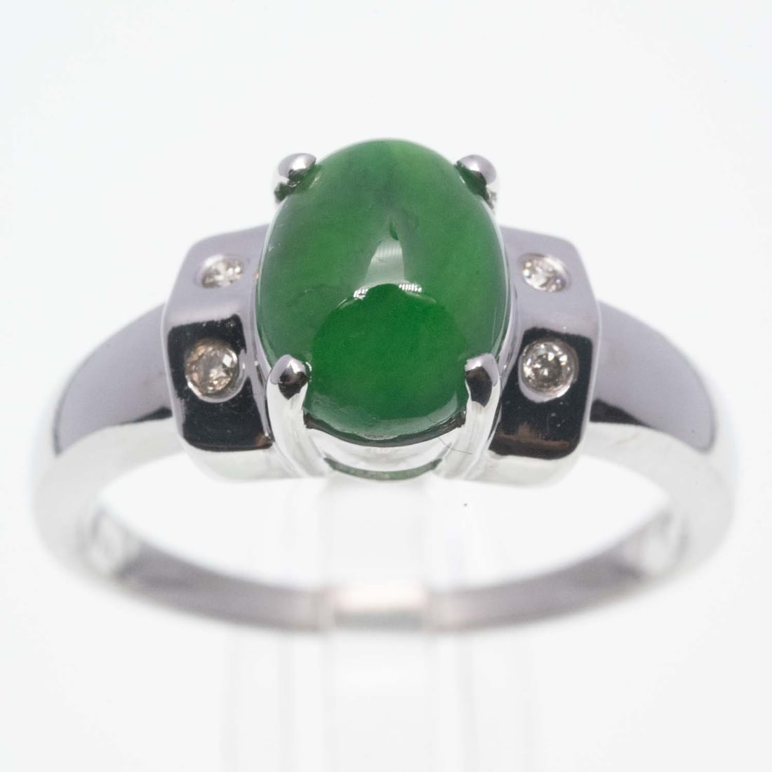 14K White Gold And Diamond Natural Cabochon Icy Jadeite Ring: Medium: Natural Cabochon Icy Jadeite Size: 7 US Age/Detail: 14K White Gold And Diamond Condition: Great Provenance: Collection from Estate in Tribecca Please view all the photos as they are part of th