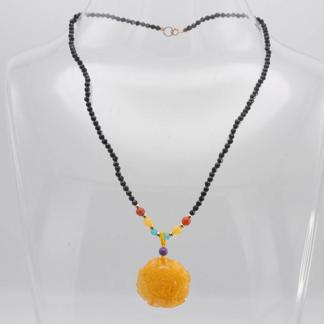 Black Onyx And Semi Precious Stone Amber Lotus Necklace: Medium: Amber Size: 1x1x0.4 inches Age/Detail: Black Onyx And Semi Precious Stone Condition: great overall, check photo for condition reference. Provenance: Collection from Estate in Williamsburg Live
