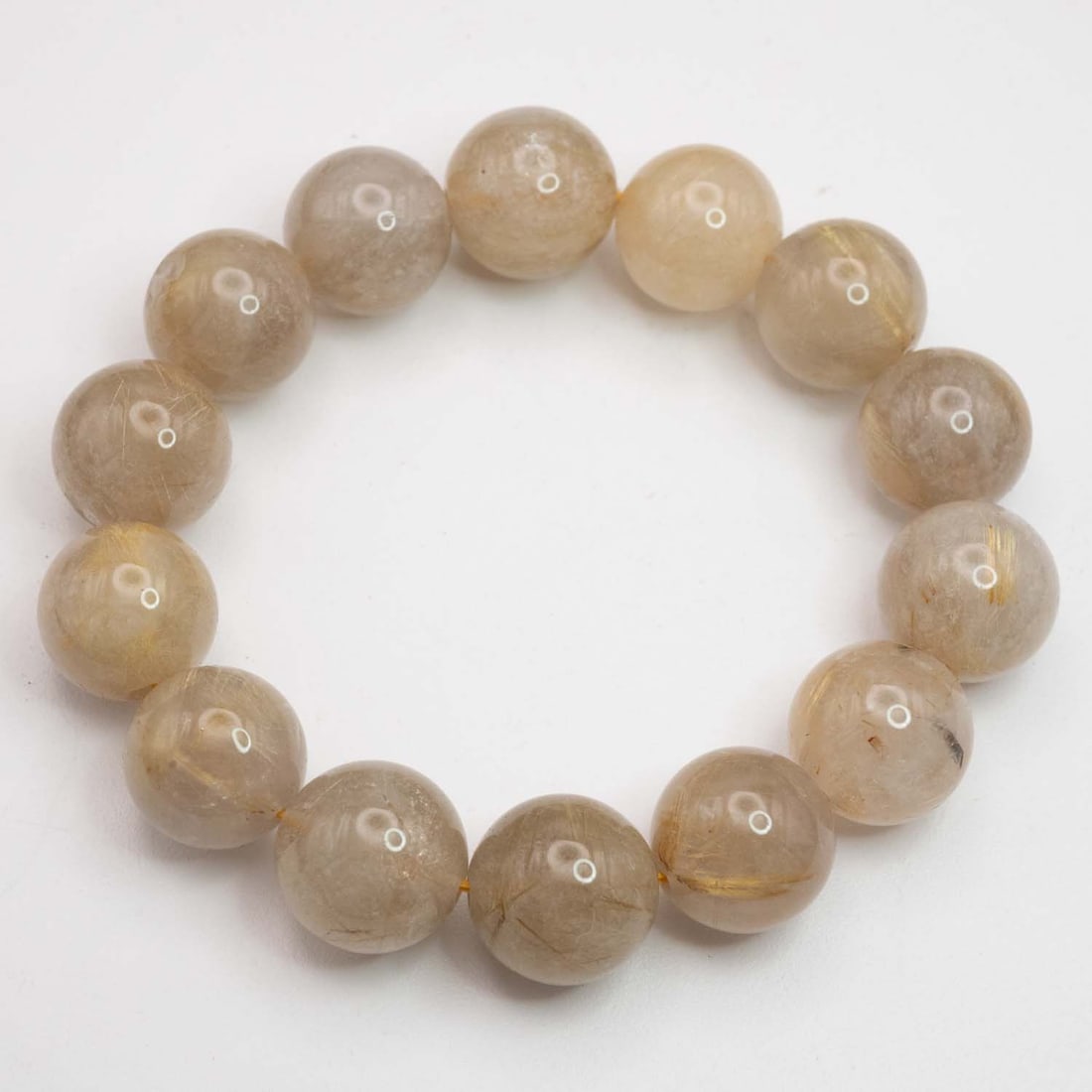 Natural Golden Rutilated Quartz Bead Bracelet: Medium: Golden Rutilated Quartz Size: 15x15mm Age/Detail: Natural Condition: great overall, check photo for condition reference. Provenance: Collection from Estate in Williamsburg LiveShipping is NOT