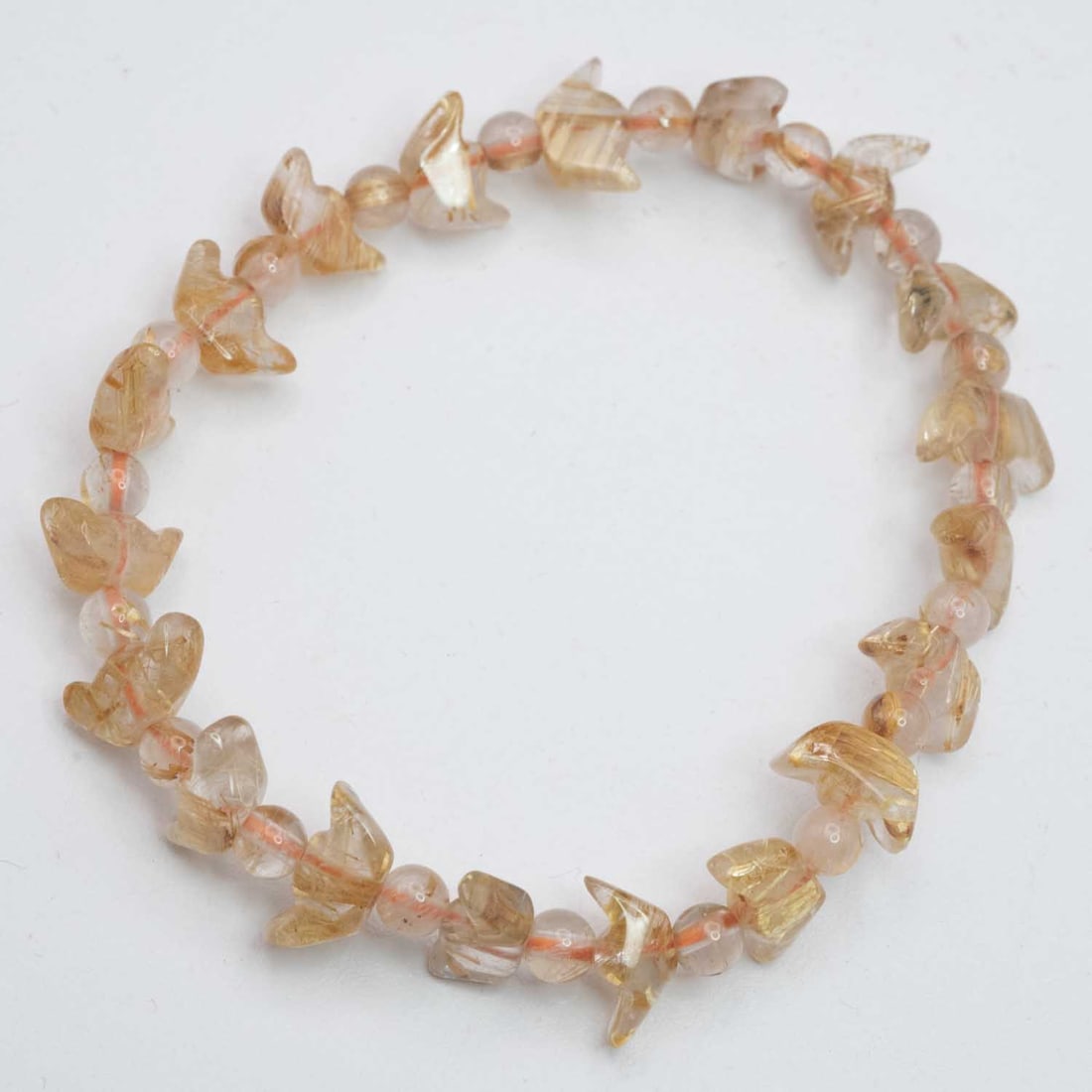 Natural Golden Rutilated Quartz Yuanbao Bracelet: Medium: Golden Rutilated Quartz Size: 10x5mm Age/Detail: Natural Condition: great overall, check photo for condition reference. Provenance: Collection from Estate in Williamsburg LiveShipping is NOT a