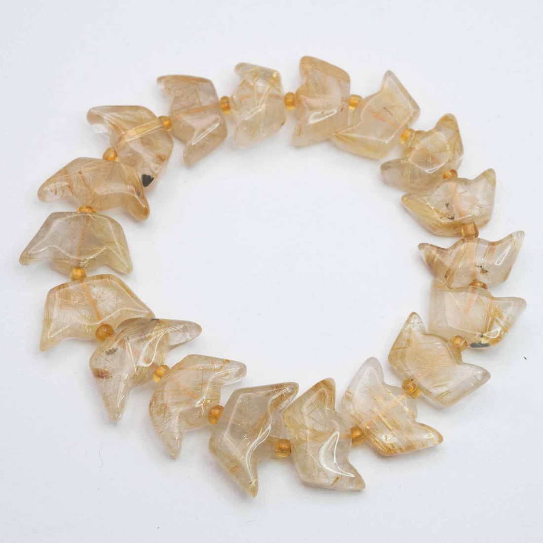 Natural Golden Rutilated Quartz Yuanbao Bracelet: Medium: Golden Rutilated Quartz Size: 15x9mm Age/Detail: Natural Condition: great overall, check photo for condition reference. Provenance: Collection from Estate in Williamsburg LiveShipping is NOT a