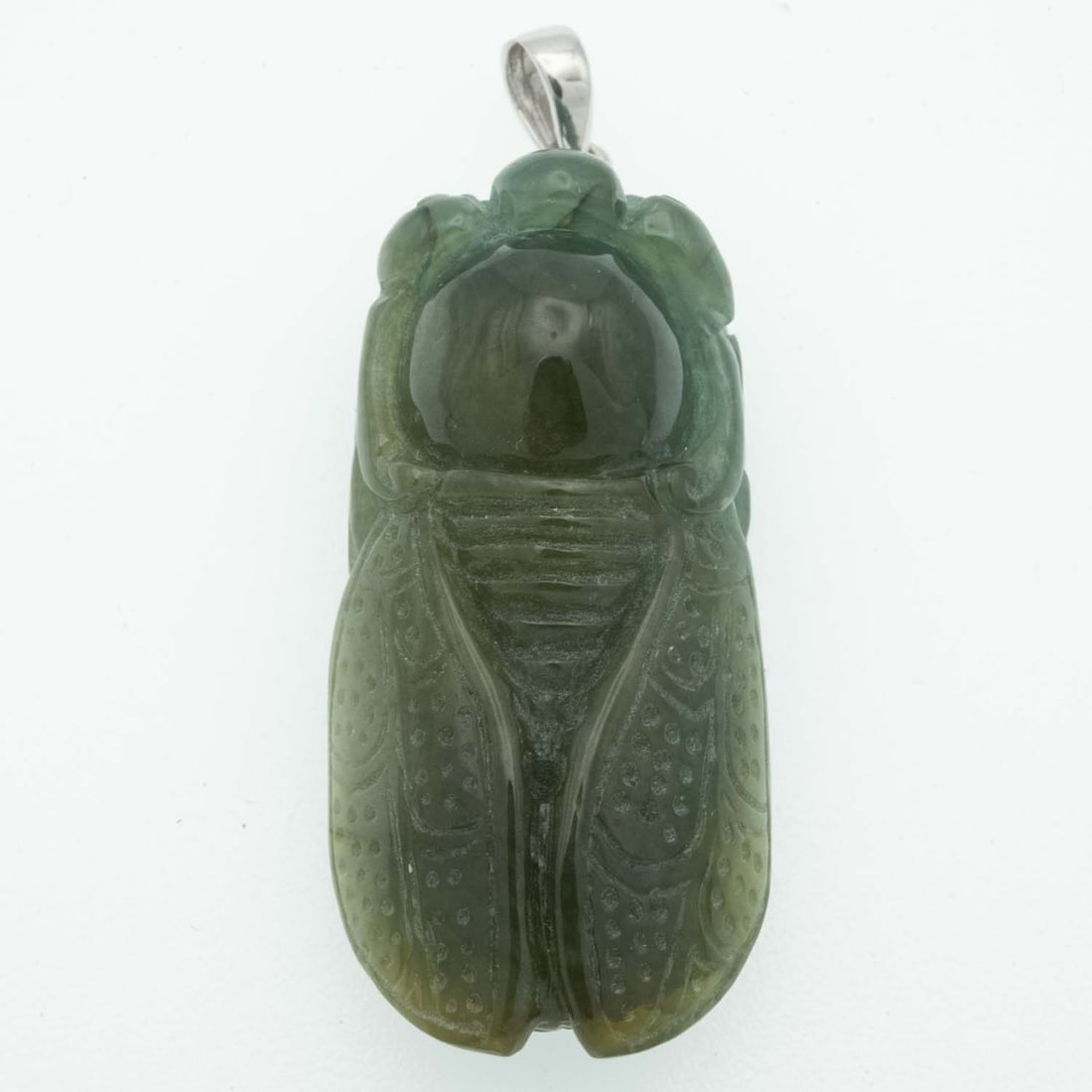 Old Chinese Carved Green Jadeite Cicada Pendant: Medium: Green Jadeite Size: 38x19x12 mm Age/Detail: Old Chinese Carved Condition: Great, check photo for detail Provenance: Collection from Estate in Tribecca Please view all the photos as they are pa