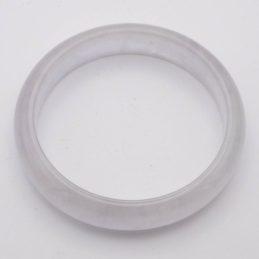 Chinese Carved Icy White Jade Bangle: Medium: Icy White Jade Size: 2.3 inches Age/Detail: Chinese Carved Condition: great overall, check photo for condition reference. Provenance: Collection from Estate in Williamsburg LiveShipping is