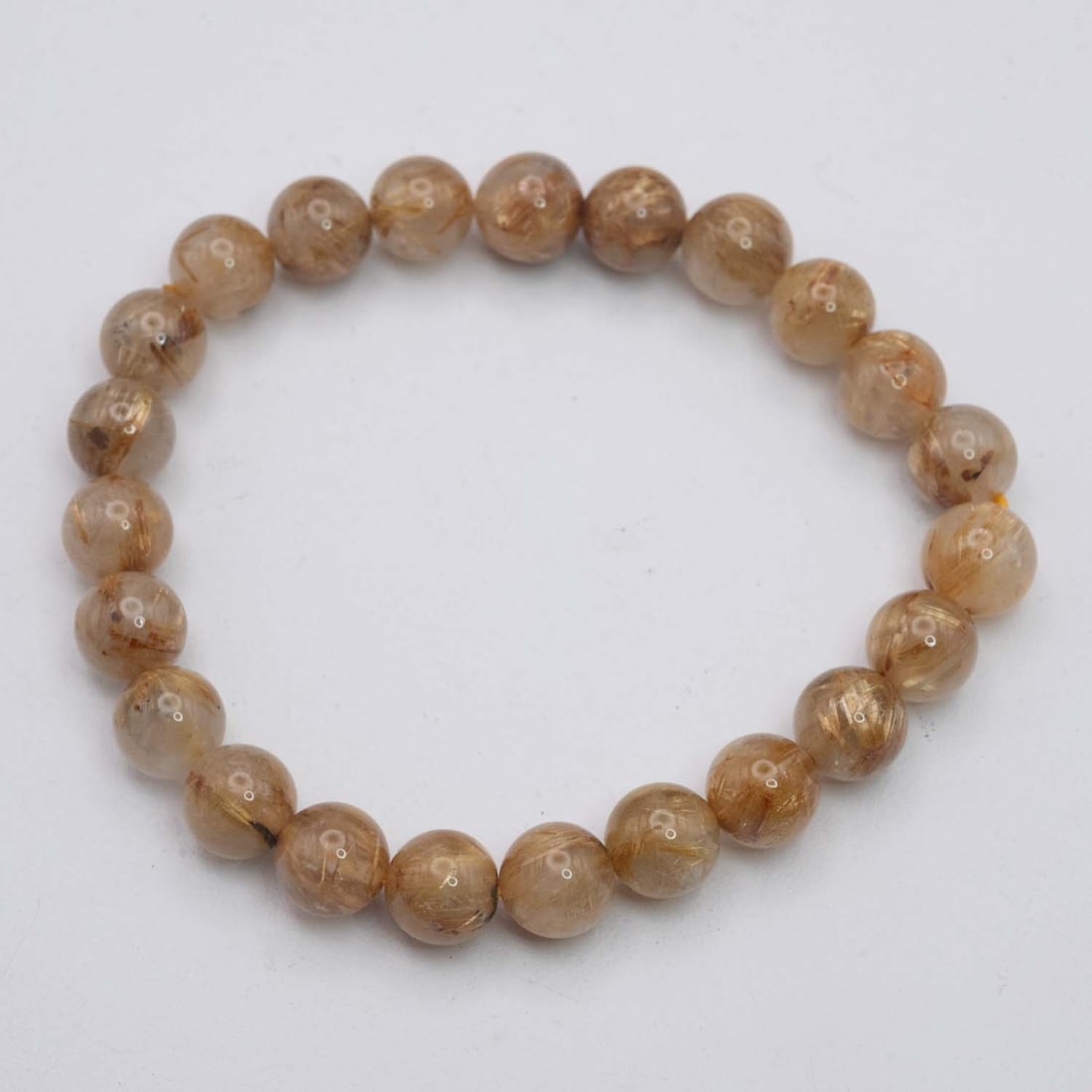 Natural Golden Rutilated Quartz Bracelet: Medium: Golden Rutilated Quartz Size: 8mm diameter each bead Age/Detail: Natural Condition: great overall, check photo for condition reference. Provenance: Collection from Estate in Williamsburg LiveS