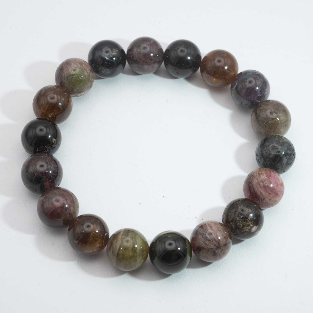 Vintage Natural Tourmaline Bead Bracelet: Medium: Tourmaline Size: 11mm Age/Detail: Vintage Natural Condition: great overall, check photo for condition reference. Provenance: Collection from Estate in Williamsburg LiveShipping is NOT a part o