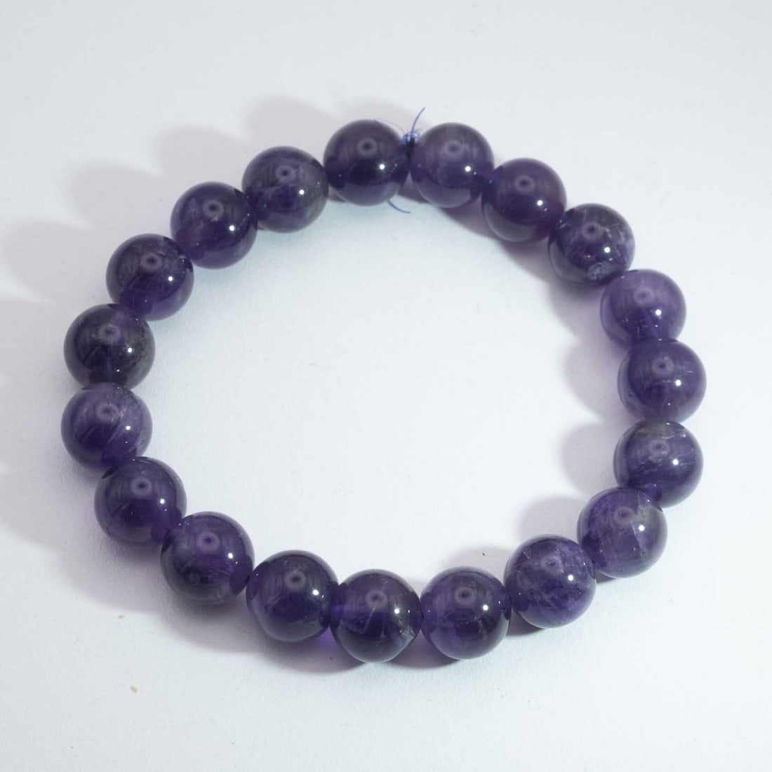 Vintage Natural Amethyst Bead Bracelet: Medium: Amethyst Size: 10mm Age/Detail: Vintage Natural Condition: great overall, check photo for condition reference. Provenance: Collection from Estate in Williamsburg LiveShipping is NOT a part of
