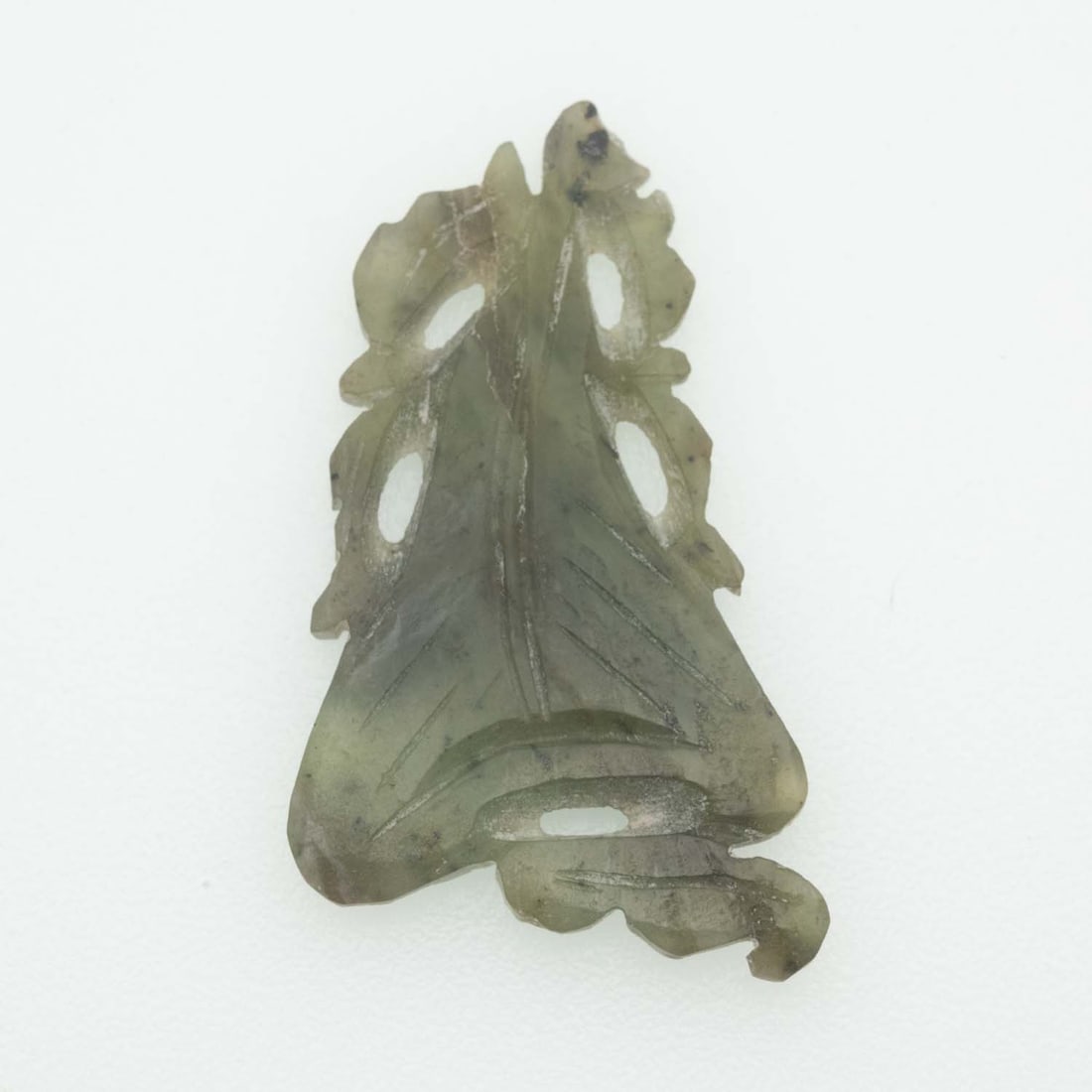 Old Carved Green Jadeite Leaf Pendant: Medium: Green Jadeite Size: 1.5x0.8 inches Age/Detail: Old Carved Condition: Great, check photo for detail Provenance: Collection from Estate in Tribecca Please view all the photos as they are part of