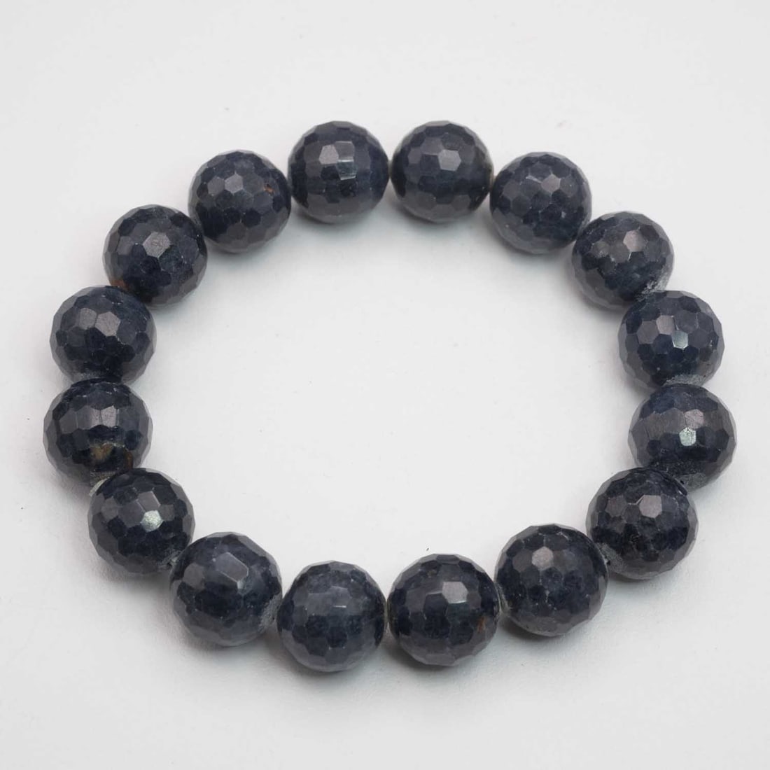 Natural Multi-Faucet Lapis Bead Bracelet: Medium: Multi-Faucet Lapis Size: 13x13mm Age/Detail: Natural Condition: great overall, check photo for condition reference. Provenance: Collection from Estate in Williamsburg LiveShipping is NOT a par