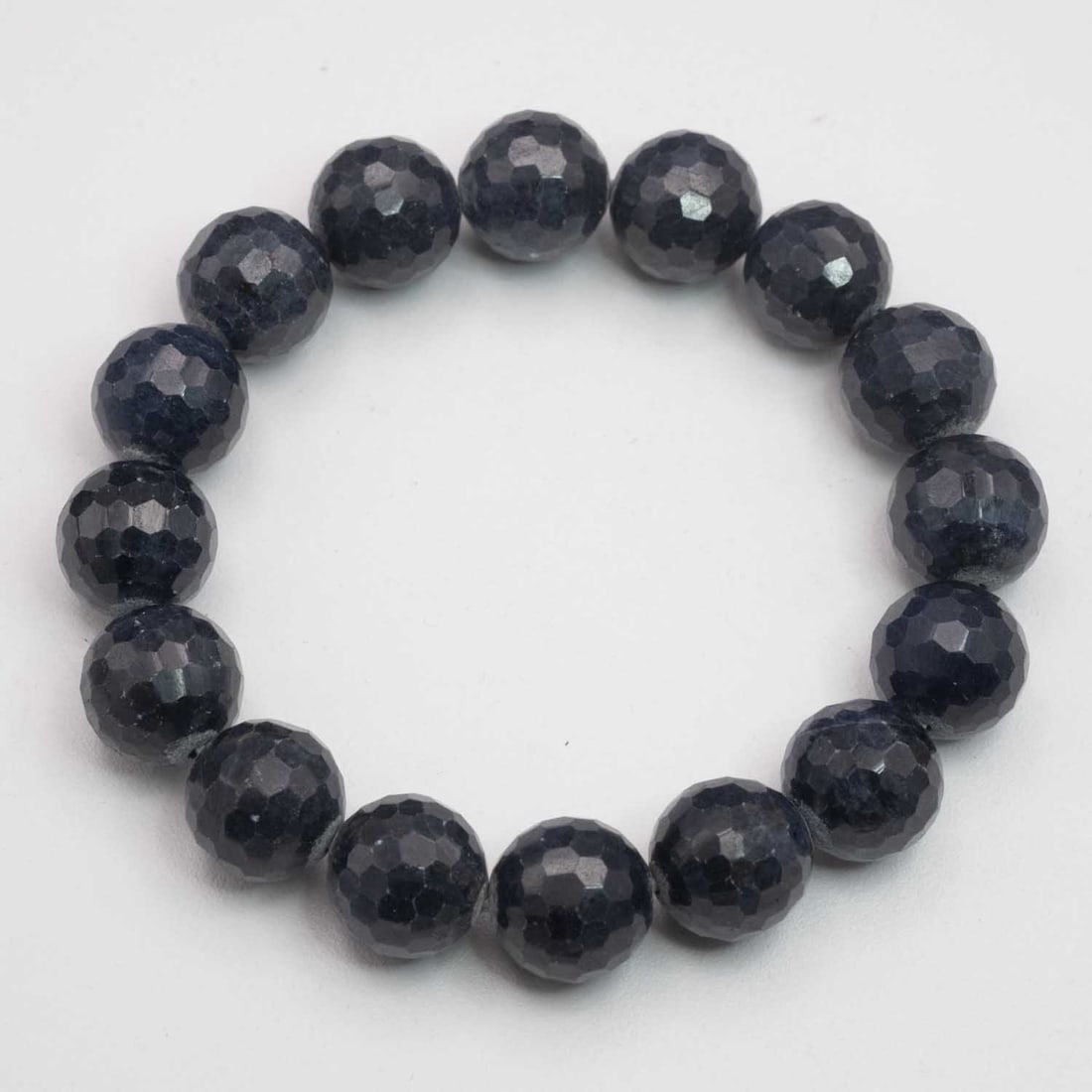Natural Multi-Faucet Lapis Bead Bracelet: Medium: Multi-Faucet Lapis Size: 13x13mm Age/Detail: Natural Condition: great overall, check photo for condition reference. Provenance: Collection from Estate in Williamsburg LiveShipping is NOT a par