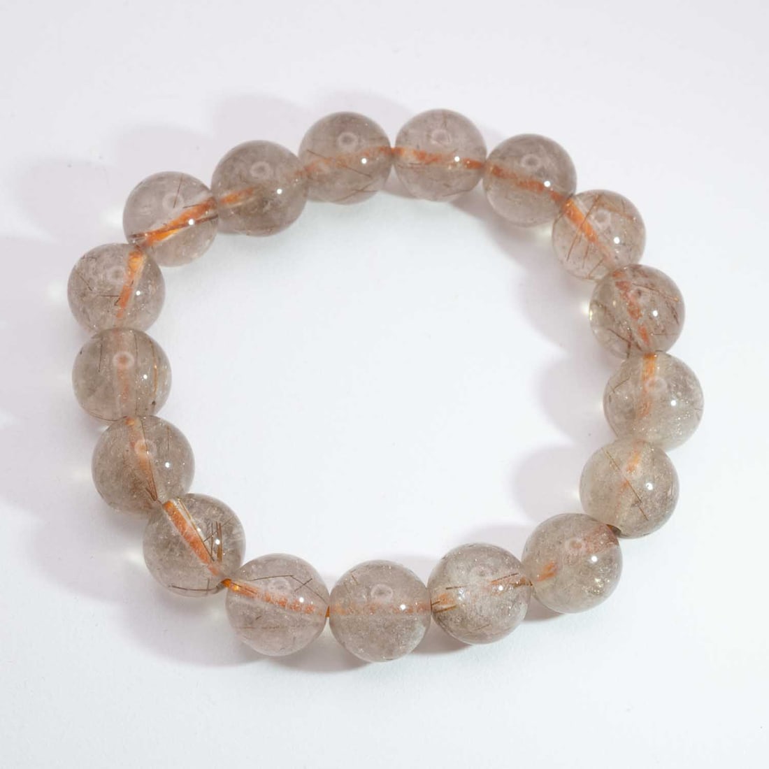 Natural Rutilated Quartz Bead Bracelet: Medium: Rutilated Quartz Size: 11mm Age/Detail: Natural Condition: great overall, check photo for condition reference. Provenance: Collection from Estate in Williamsburg LiveShipping is NOT a part of