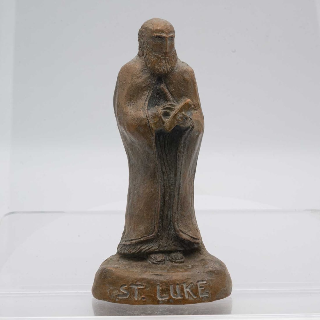 Vintage Resin Saint Luke Wall Sculpture: Medium: Resin Size: 5.8x3x1.5 inches Age/Detail: Vintage Condition: great overall, check photo for condition reference Provenance: Collection from Estate in Tribecca Please view all the photos as they