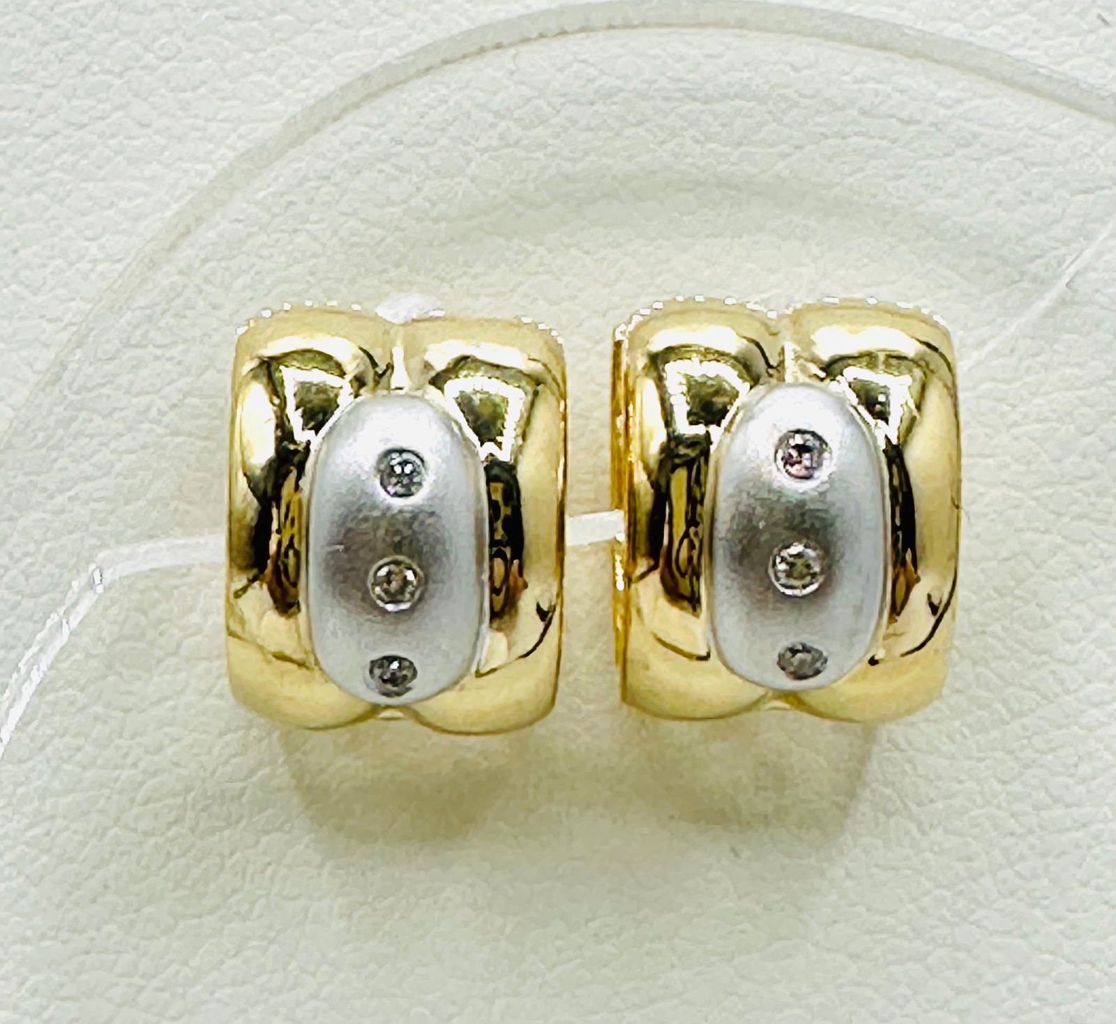 Pair of Natural Diamond Heavy Small Huggies Earrings, 14KT Yellow and White Gold # 2646: # 2646 Pair of Natural Diamond Heavy Small Huggies Earrings, 14KT Yellow and White Gold 6 pieces diamond 0.04 carat(t.w.) Earrings Weight: 4.60 grams(t.w.) Hinge hook closure Earrings Size: 11 mm X 8.