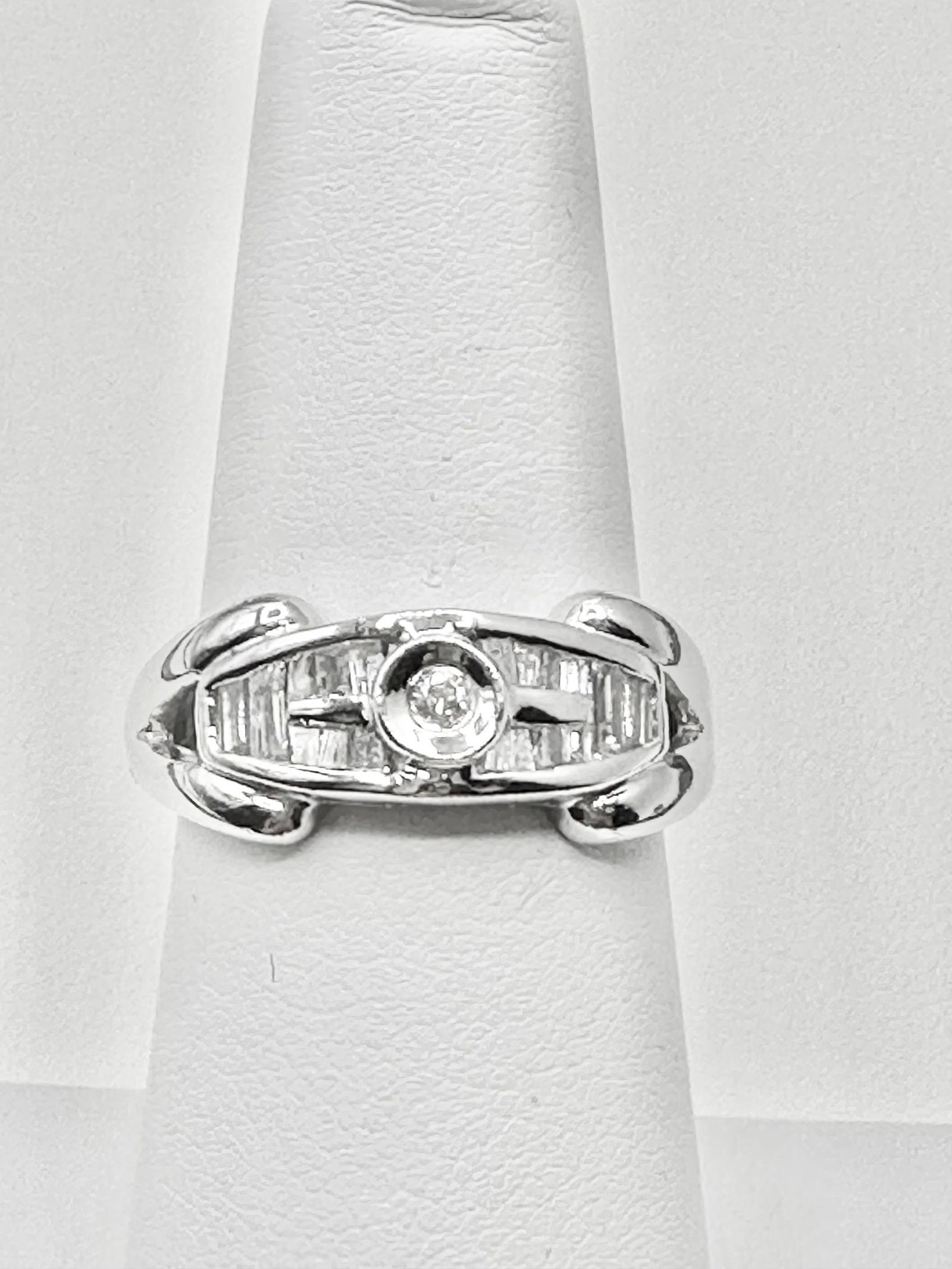 14KT White Gold with 19 Pcs Round & Beguette Diamond Ring Size 6.5 - J11134: * Nature Diamond Ring * 14KT White Gold * 19 pcs round & baguette diamond 0.30 Carat ( t.w.) * Clarity VS-SI, Color G-K * Ring Weight 4.60 grams * Ring Size 6.5 * Packed in box * 11134