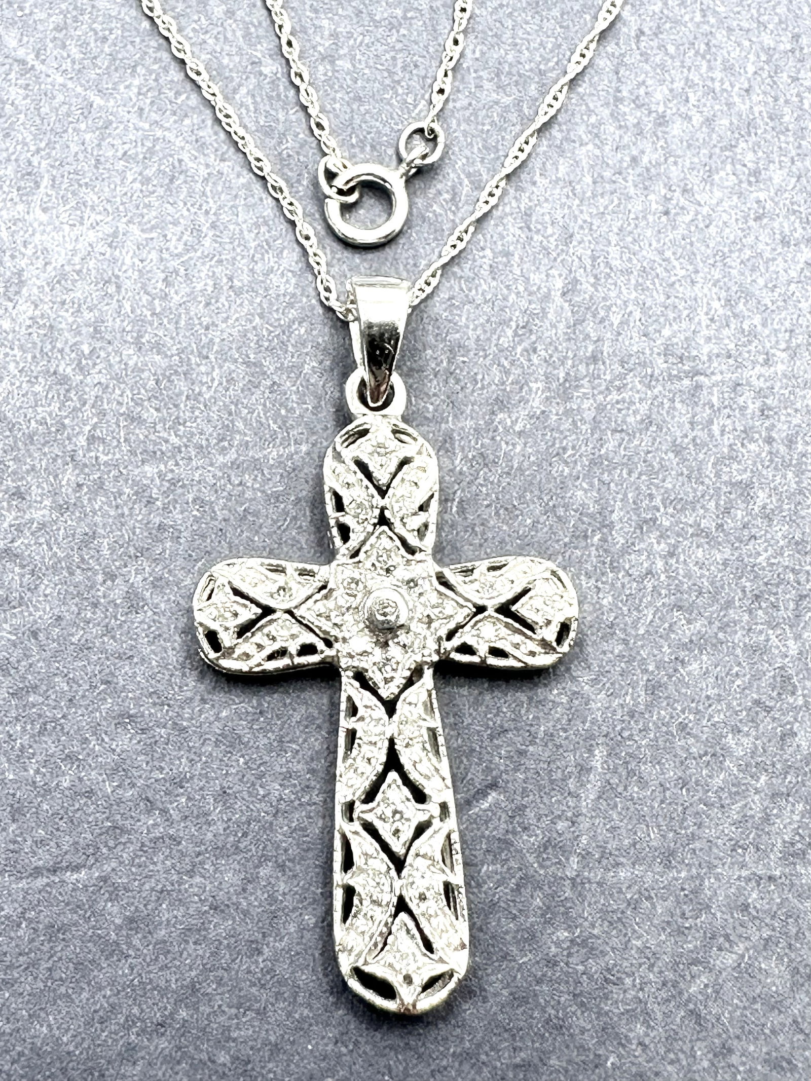 14kT White Gold With 16 Pcs Natural Diamond Cross Pendant Necklace - J11151: * Natural Diamond Cross Pendant and 18” Chain. * 14KT White Gold * 16 pcs diamond 0.12 Carats(t.w.) * Clarity VS-SI, Color G-K * Pendant and Chain Weight 2.70 grams(t.w.) * Spring ring clasp * P
