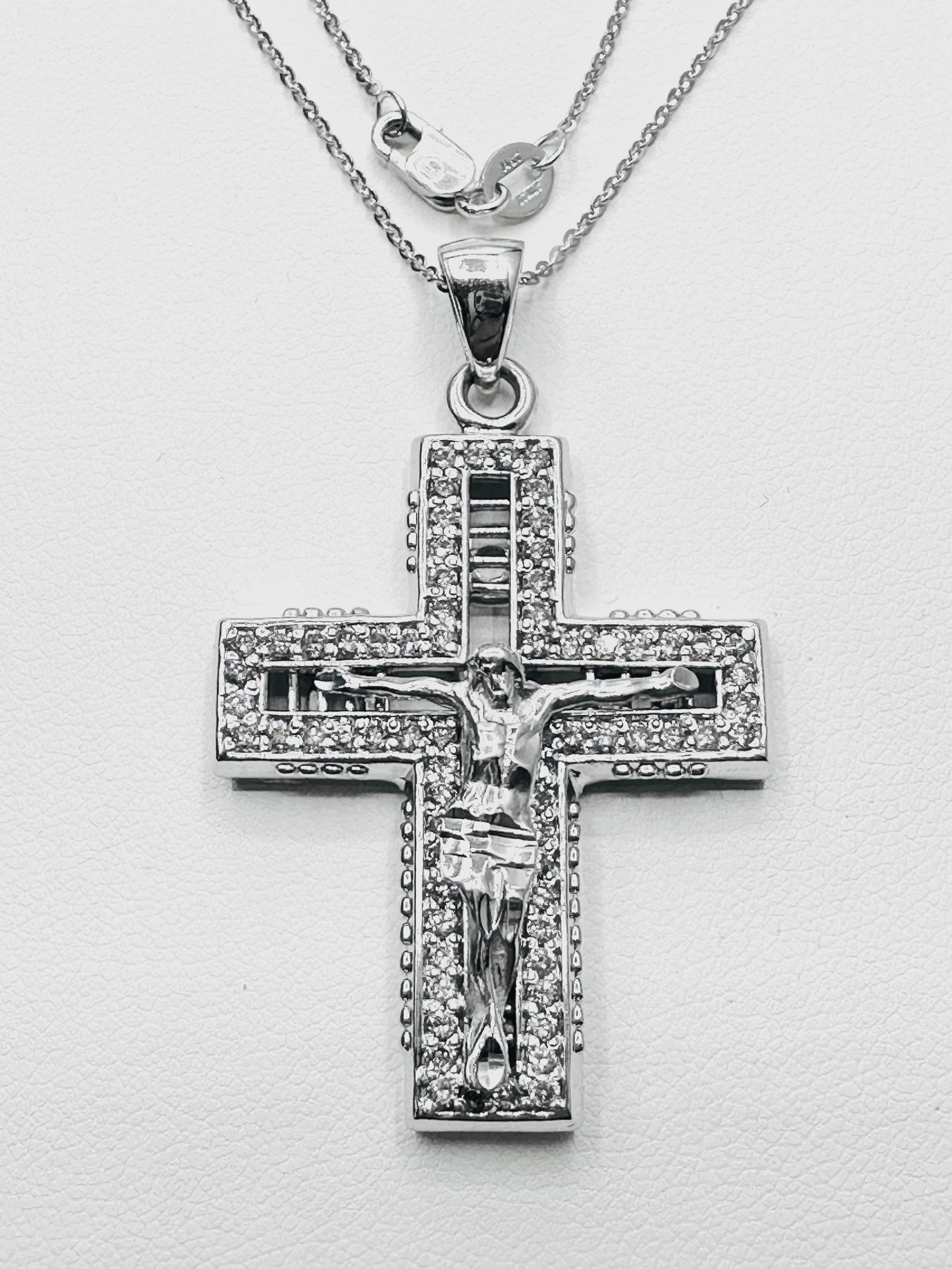 14KT White Gold 70 Pcs Natural Diamond 1.45 Ct Necklace - J11168: * 14KT White Gold Natural Diamond Cross Pendant with Jesus and 16” Fancy Chain * 70 pcs round diamond 1.45 Carats (t.w.) * Clarity VS-SI, Color G-K * Pendant and Chain Weight 12.50 Grams * Penda
