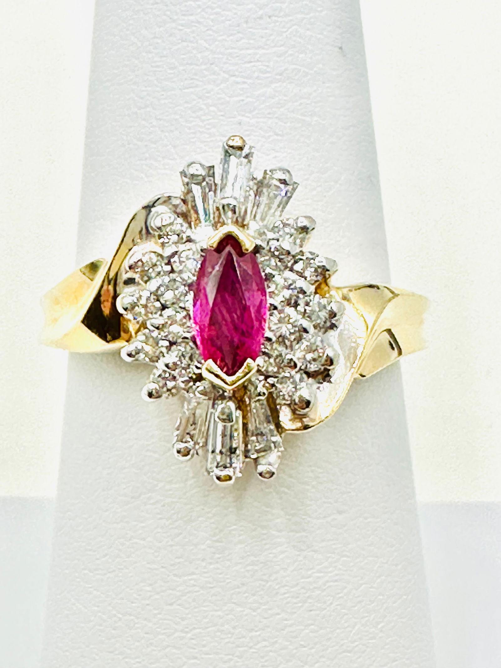 14KT Yellow Gold Natural Ruby And Diamond Ring Size 7 -J11382: * 14KT Yellow Gold Natural Ruby and Diamond Ring * 1 pc marquis Ruby 0.30 carat * 24 pcs baguette and round Diamond 0.50 carat(t.w.) * Diamond Clarity VS-SI, Color G-K, * Condition: New in Box * Ring