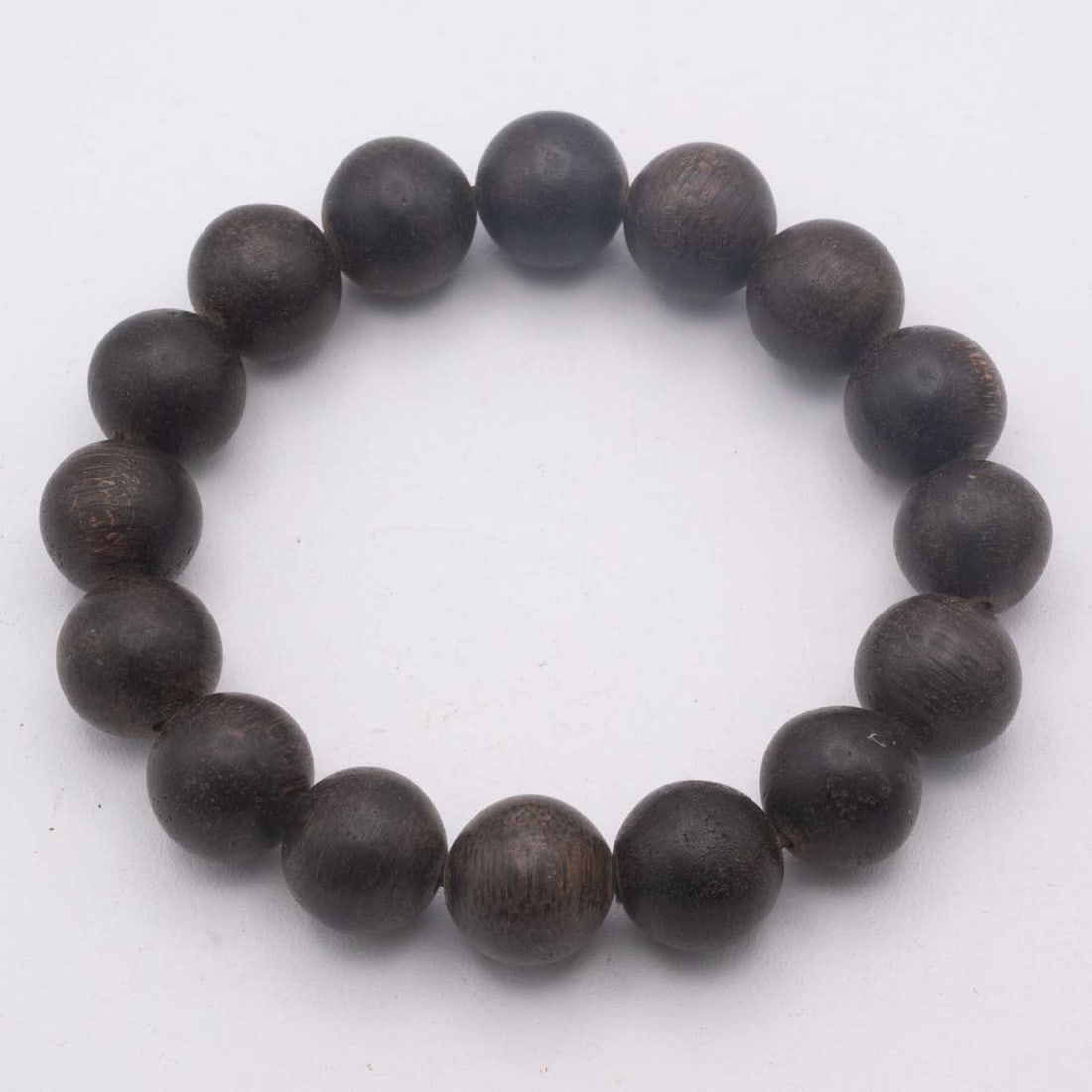 Chinese Agarwood Bead Bracelet: Medium: Agarwood Size: 0.6x0.6 inches Age/Detail: Chinese Condition: great overall, check photo for condition reference. Provenance: Collection from Estate in Williamsburg LiveShipping is NOT a part o