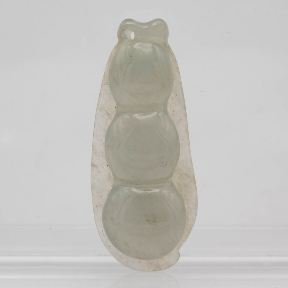 Chinese Carved Natural Icy Jadeite Pea Pendant: Medium: Natural Icy Jadeite Size: 1.4x0.6x0.3 inches Age/Detail: Chinese Carved Condition: great overall, check photo for condition reference. Provenance: Collection from Estate in Williamsburg LiveSh