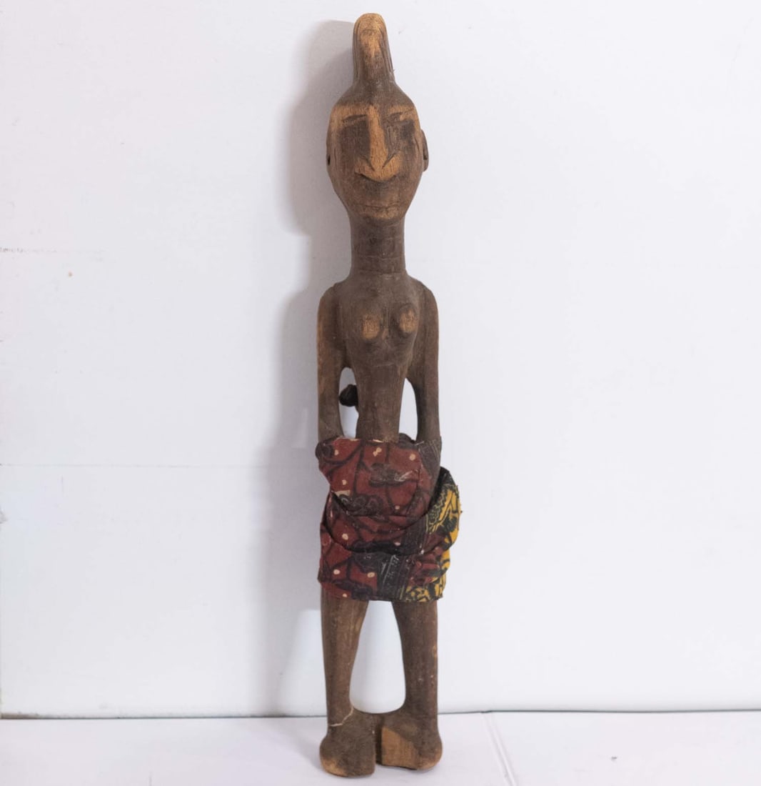 Old West African Yoruba Carved Wood Female Shrine Figure: Medium: Wood Size: 3x3x16.5 inches Age/Detail: Old West African Yoruba Carved Condition: great overall, check photo for condition reference. Provenance: Collection from Estate in Williamsburg 