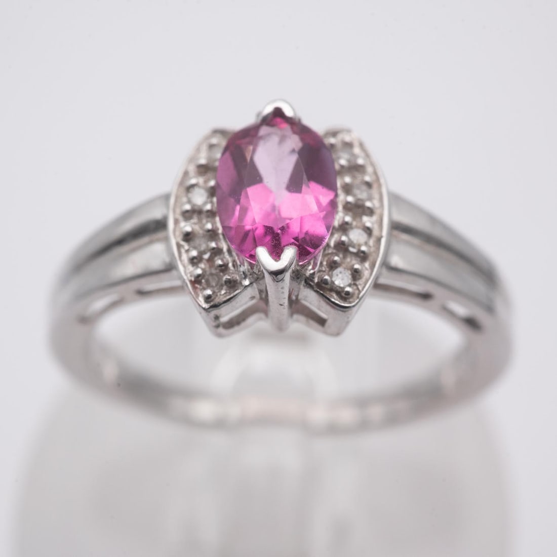Pink Sapphire And Diamond 14K White Gold Ring: Medium: Pink Sapphire And Diamond Size: US 6.75, 3.7 gram Age/Detail: Condition: great overall, check photo for condition reference. Provenance: Collection from Estate in Tribecca LiveShipping is NOT