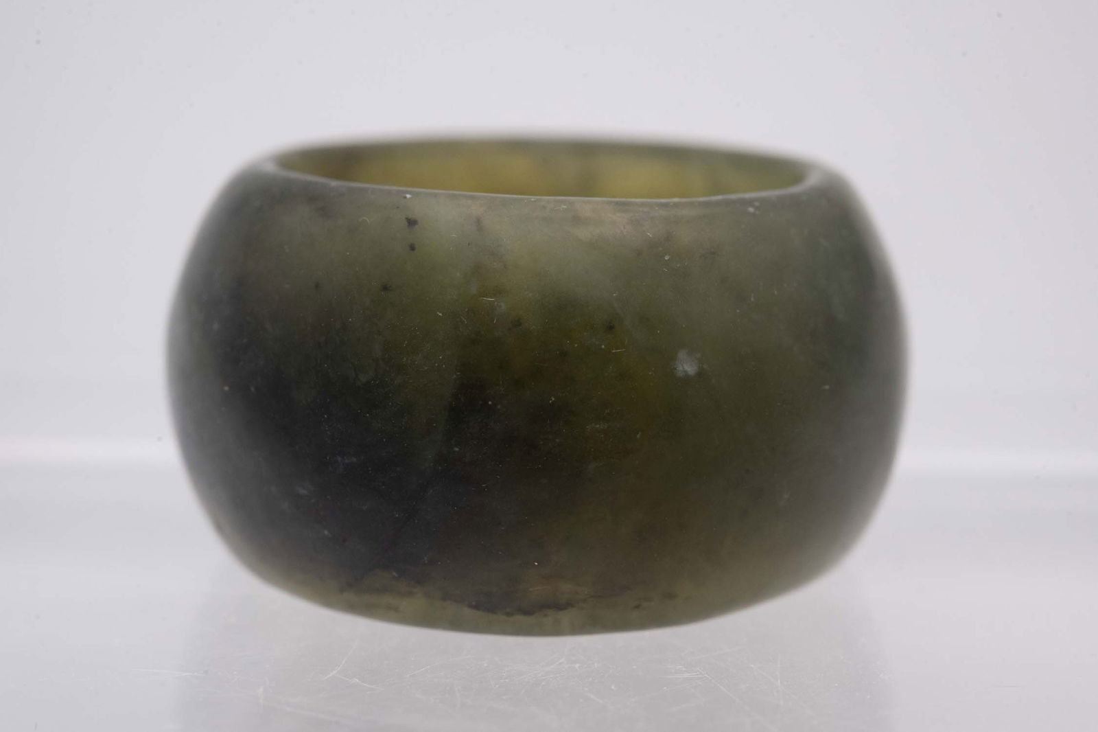 Chinese Carved Natural Icy Green Jadeite Ring: Medium: Natural Icy Green Jadeite Size: 0.7 inches Age/Detail: Chinese Carved Condition: great overall, check photo for condition reference. Provenance: Collection from Estate in Tribecca LiveShipping