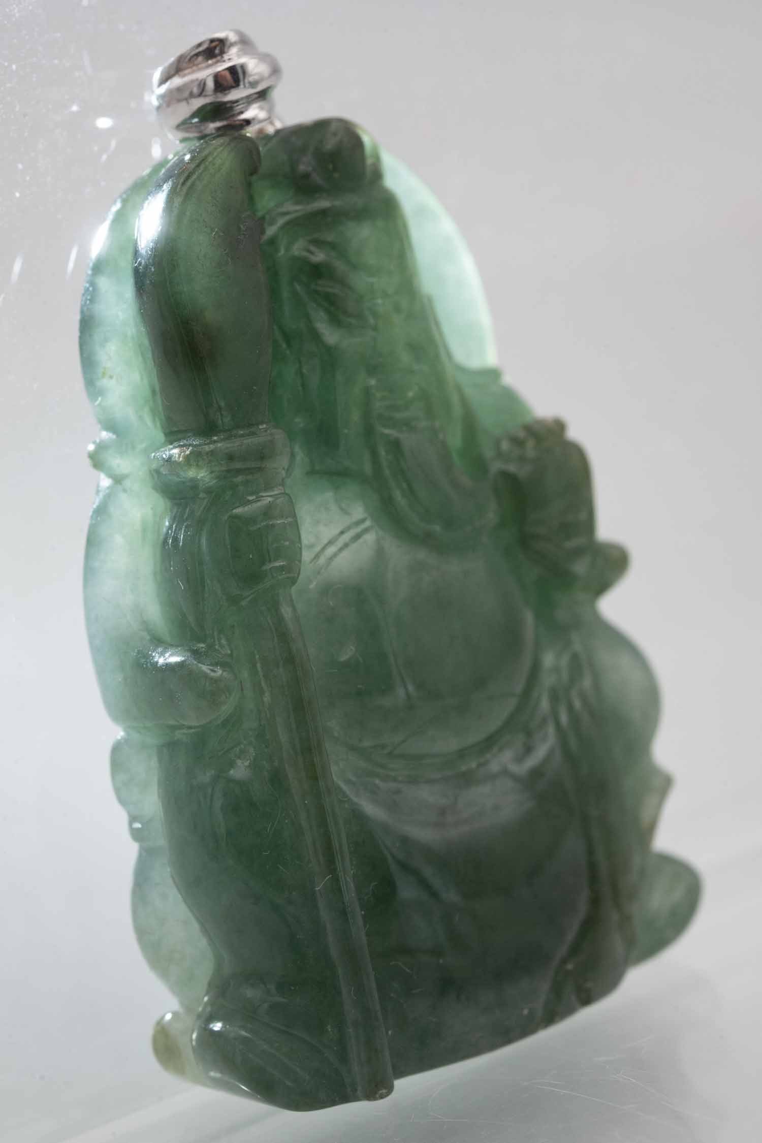 Chinese Carved Natural Green Jadeite Guanyu Pendant: Medium: Natural Green Jadeite Size: 2x1.3x0.5 inches Age/Detail: Chinese Carved Condition: great overall, check photo for condition reference. Provenance: Collection from Estate in Tribecca LiveShippi