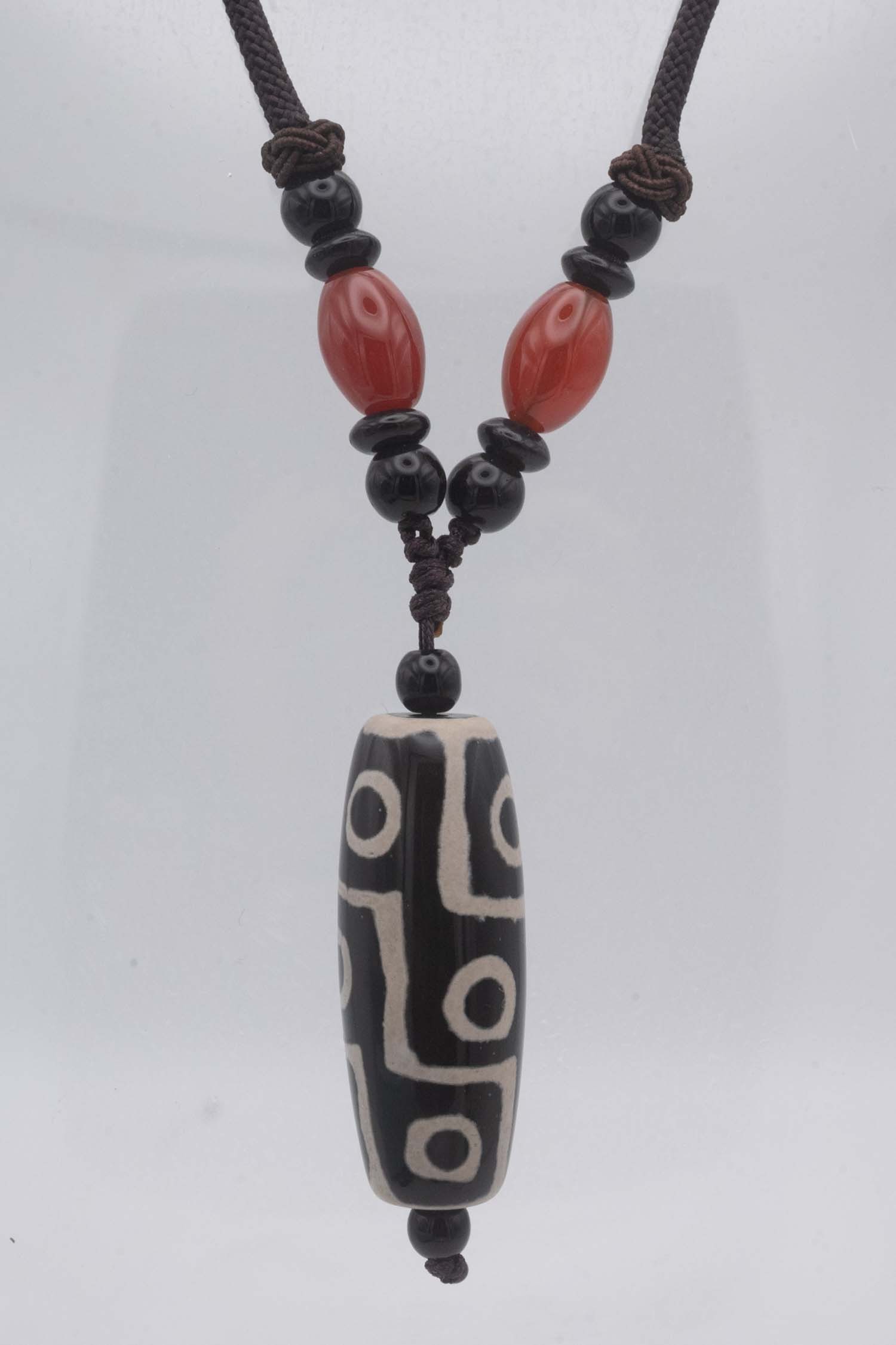 Antique Chinese Tibetan Dzi Bead Pendant: Medium: Dzi Bead Size: 1.5x0.6 inches Age/Detail: Antique Chinese Tibetan Condition: great overall, check photo for condition reference. Provenance: Collection from Estate in Tribecca LiveShipping is