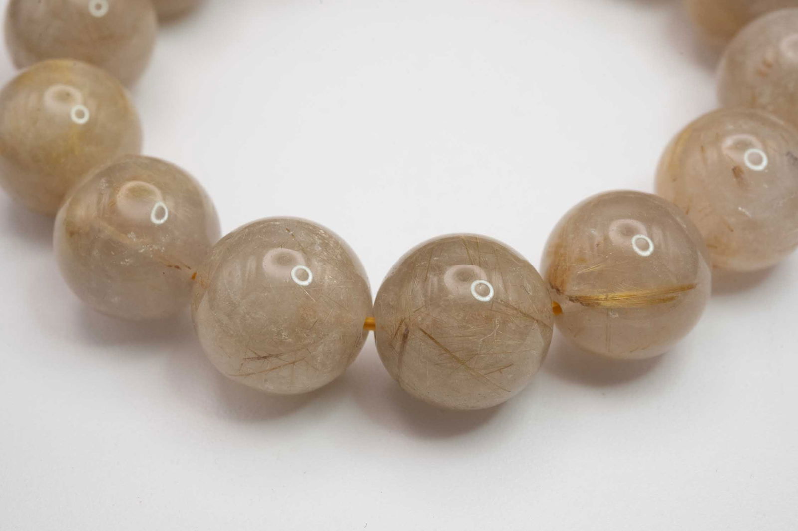 Natural Golden Rutilated Quartz Bead Bracelet: Medium: Golden Rutilated Quartz Size: 15x15mm Age/Detail: Natural Condition: great overall, check photo for condition reference. Provenance: Collection from Estate in Williamsburg LiveShipping is NOT