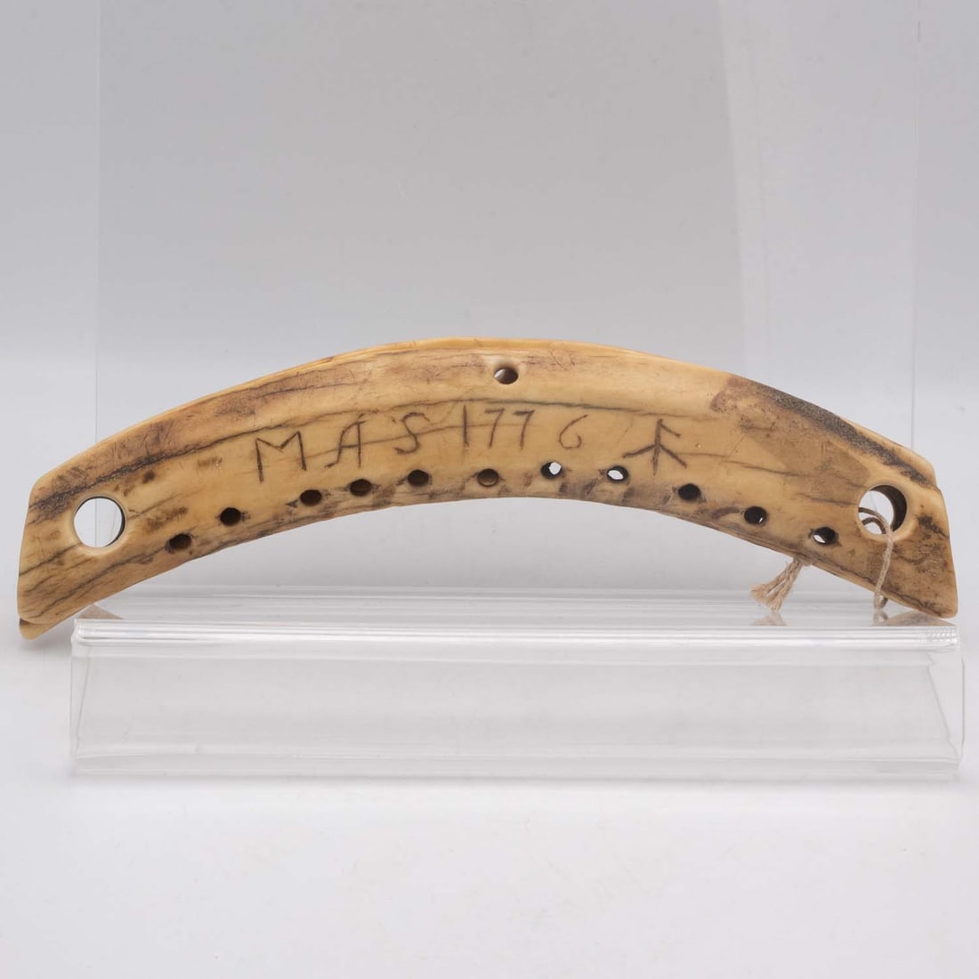 Antique Carved Antler/Bone Amulet With Drilled Holes: Medium: Antler/Bone Size: 9.5x3x1 inches Age/Detail: Antique Carved Condition: great overall, check photo for condition reference. Provenance: Collection from Estate in Williamsburg LiveShipping is NO