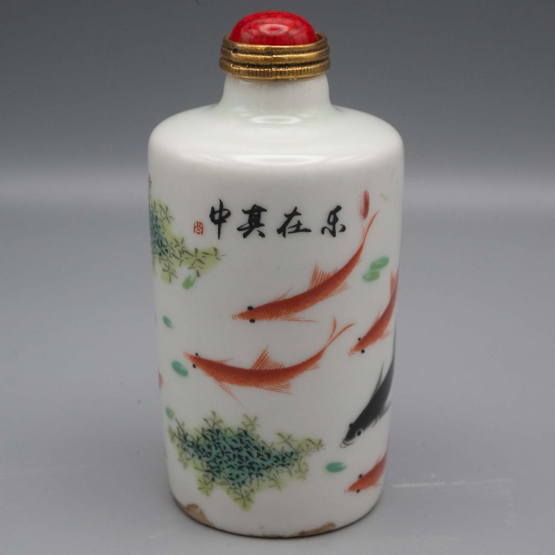 Antique Chinese Qing/Republic Porcelain Snuff Bottle: Medium: Porcelain Size: 1.7x1.7x3.3 inches Age/Detail: Antique Chinese Qing/Republic Condition: great overall, check photo for condition reference. Chinese porcelain snuff bottle decorated with goldfi