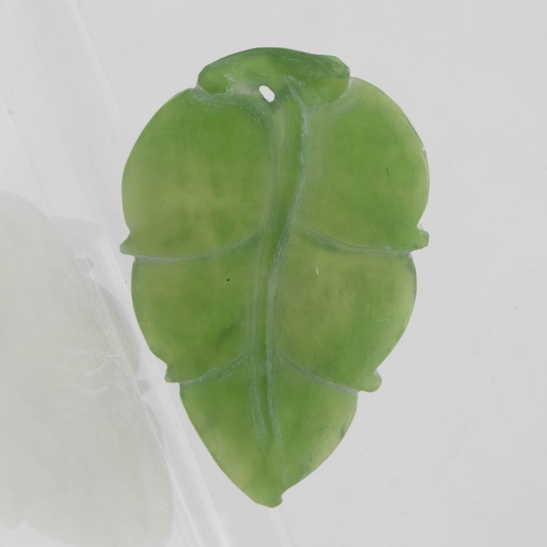 Chinese Carved Xiu Jade Pendant: Medium: Xiu Jade Size: 1.3x0.7x0.1 inches Age/Detail: Chinese Carved Condition: great overall, check photo for condition reference. Provenance: Collection from Estate in Williamsburg LiveShipping is N