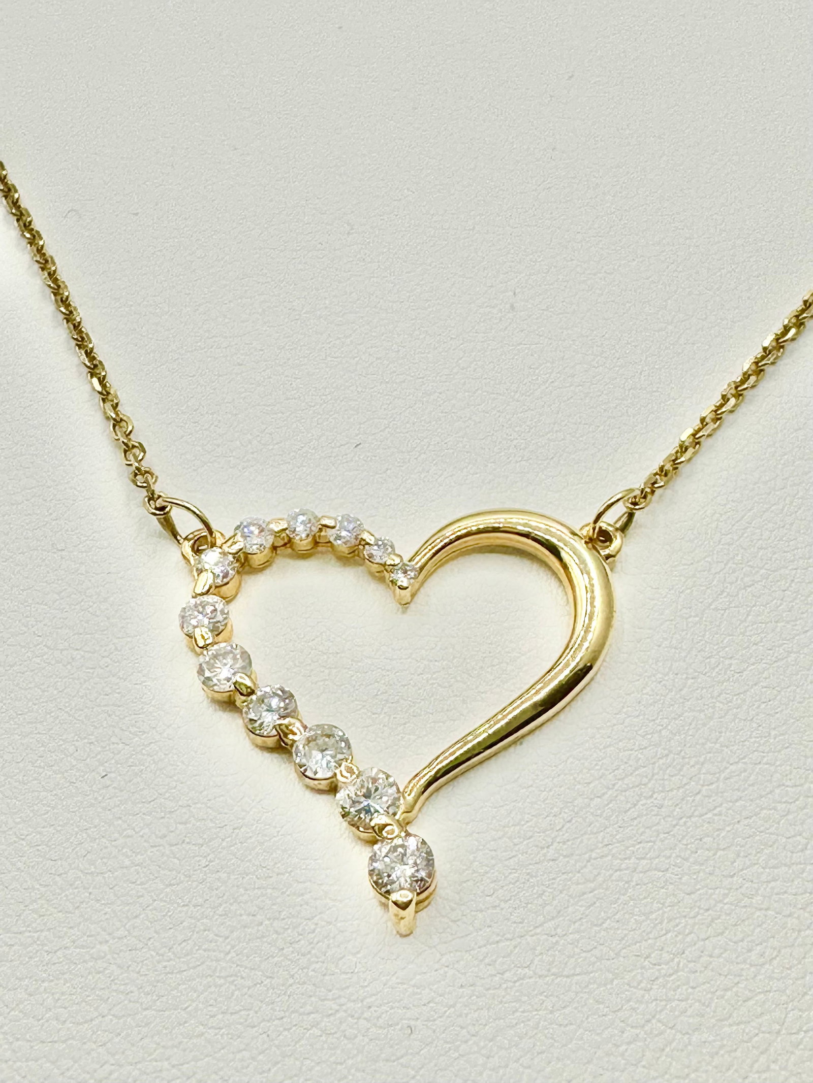 Natural Diamond Heart Pendant Necklace in 14KT Yellow Gold - J11126: * Natural Diamond Heart Pendant Necklace 17”, * 14KT Yellow Gold; * 12 pcs diamond 0.80 Carat ( t.w.); * Clarity VS-SI, Color G-K; * Pendant & Chain Weight 4.90 grams; * lobster claw clasp; * Me
