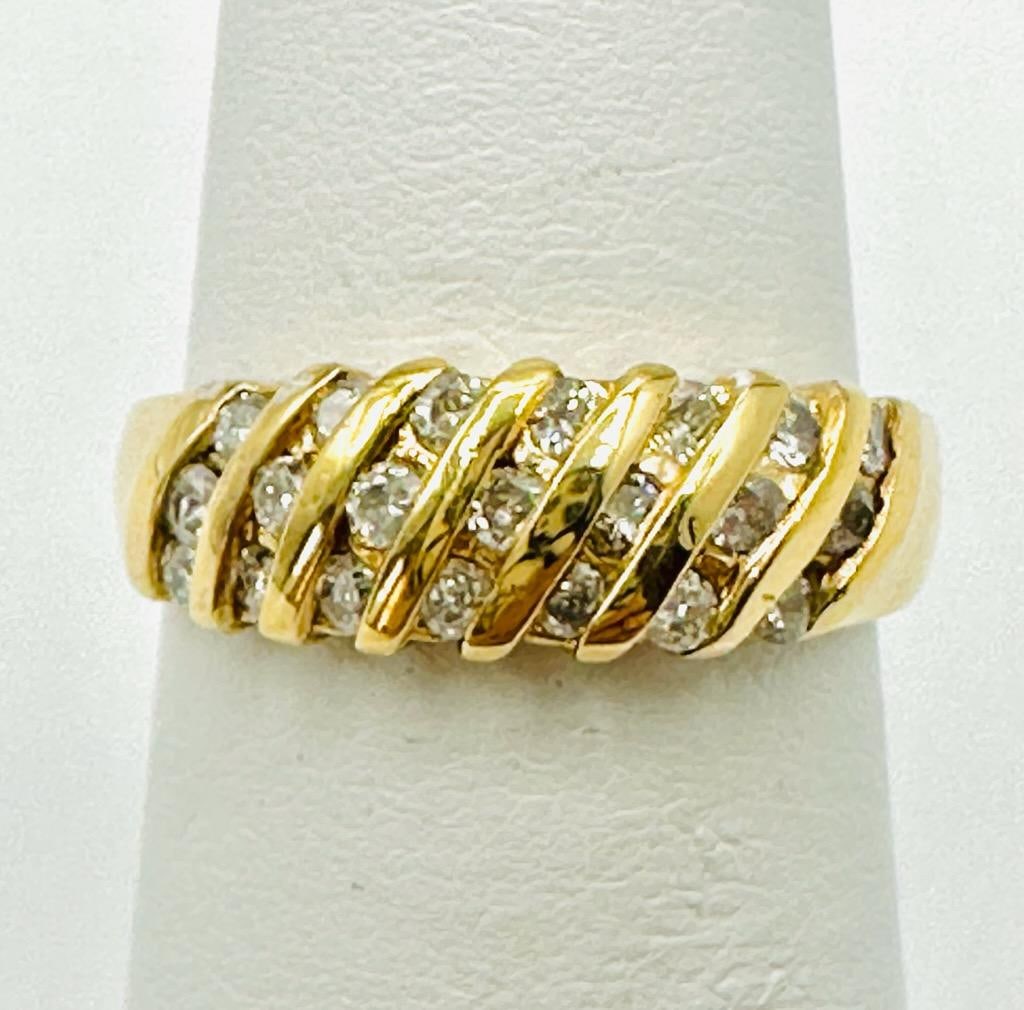 14KT Yellow Gold Natural Diamond Ring # 2018: # 2018 14KT Yellow Gold Natural Diamond Ring 21 pcs diamond 0.40 carat (t.w.) Ring Weight: 3.20 grams Ring Size 5.5
