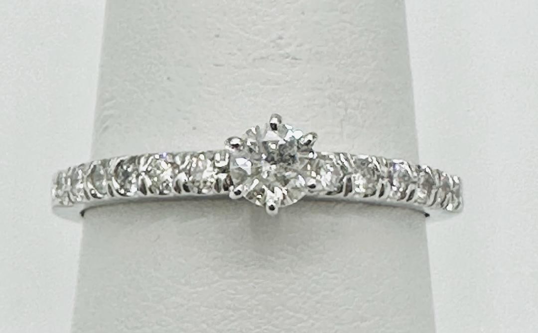 14KT White Gold Natural Diamond Lady’s # 2054: # 2054 14KT White Gold Natural Diamond Lady’s Engagement Ring 1 pc center diamond 0.21 carat 12 pcs sides diamond 0.30 carat?t.w.) Ring Weight: 2.40 grams Ring Size: 8.25