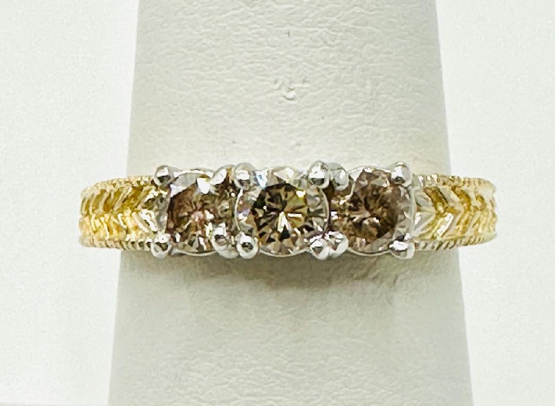 14KT Yellow and White Gold Natural Diamond Ring # 2058: # 2058 14KT Yellow and White Gold Natural Diamond Ring 3 pcs Champagne Diamond 0.62 carat?t.w.) Ring Weight: 3.10 grams Ring Size: 7