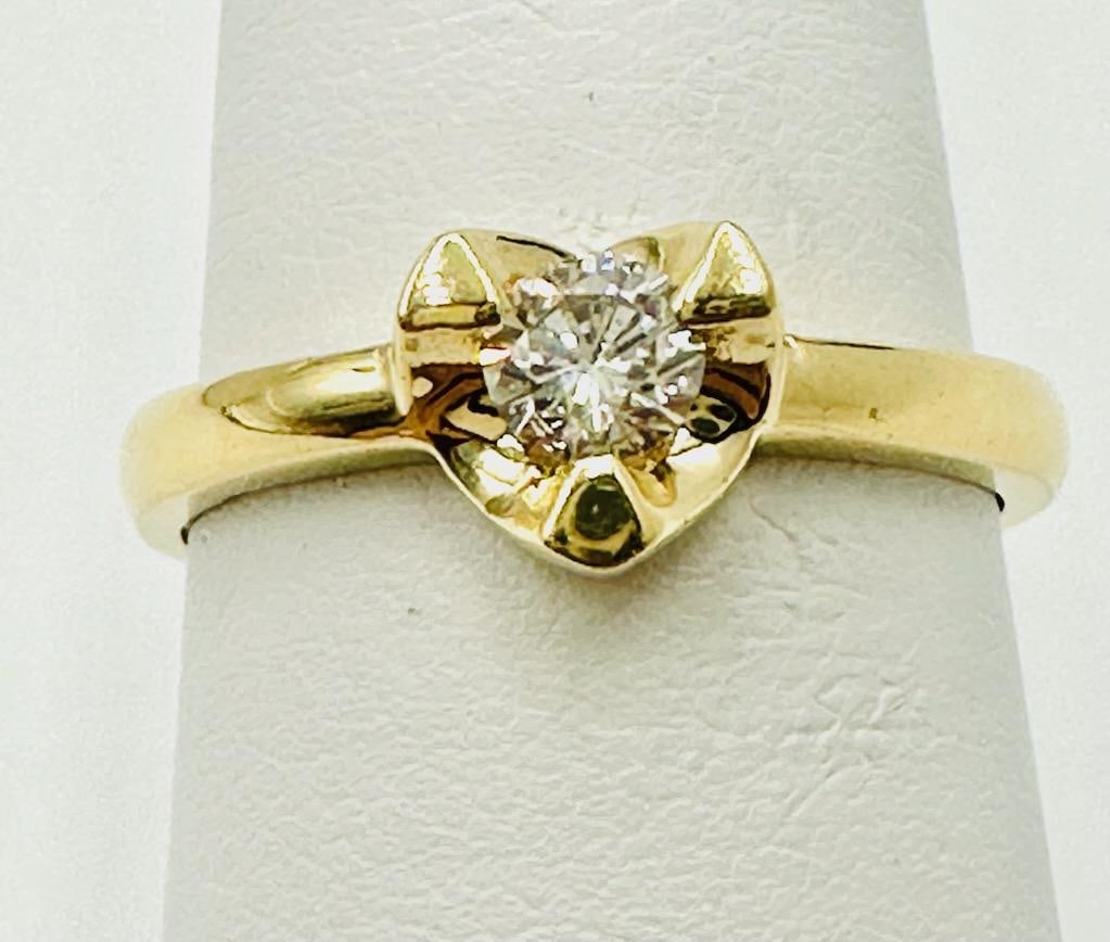 14KT Yellow Gold Natural Diamond Heart Ring # 2061: # 2061 14KT Yellow Gold Natural Diamond Heart Ring 1 Piece Diamond 0.23 carat Ring Weight: 2.70 grams Ring Size: 6.25