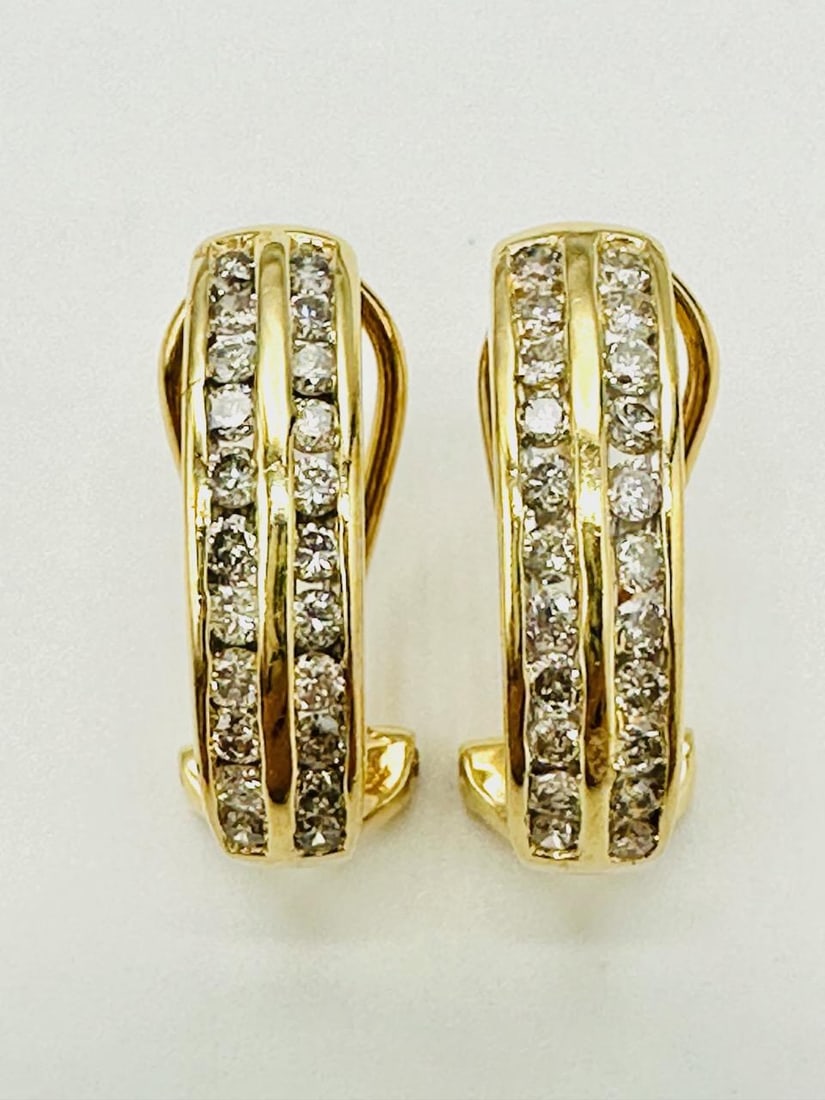 14KT Yellow Gold Pair of Natural Diamond Double Rows Earrings # 2128: # 2128 14KT Yellow Gold Pair of Natural Diamond Double Rows Earrings 44 pieces diamond 1.00 carat (t.w.) Earrings Weight: 4.00 grams French Clip backs Earrings size: 18.50 mm x 5 mm