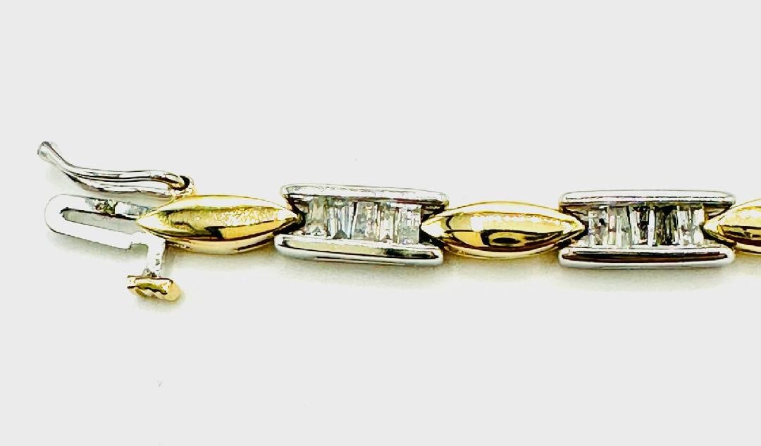 14KT White and Yellow Gold Natural Diamond Bracelet # 2186: # 2186 14KT White and Yellow Gold Natural Diamond Bracelet Baguette Diamond 1.65 carats (t.w.) Bracelet Weight: 12.60 grams Bracelet size: 7” x 4.30 mm