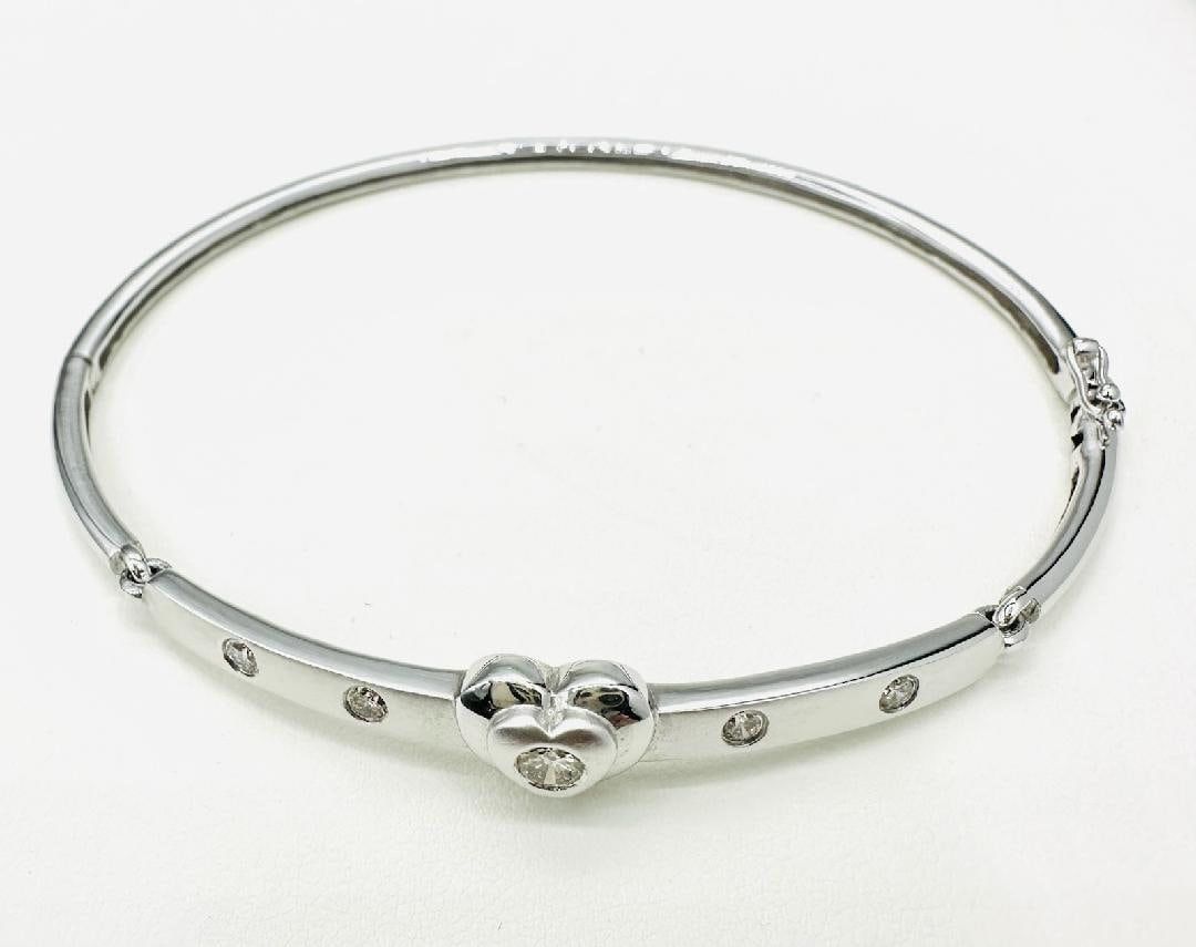 Natural Diamond Heart Bangle Bracelet in 14KT White Gold # 2194: # 2194 Natural Diamond Heart Bangle Bracelet in 14KT White Gold 5 Pieces Diamond 0.35 carat(t.w.) Weight: 10.70 grams Approx. Length: 8.5”