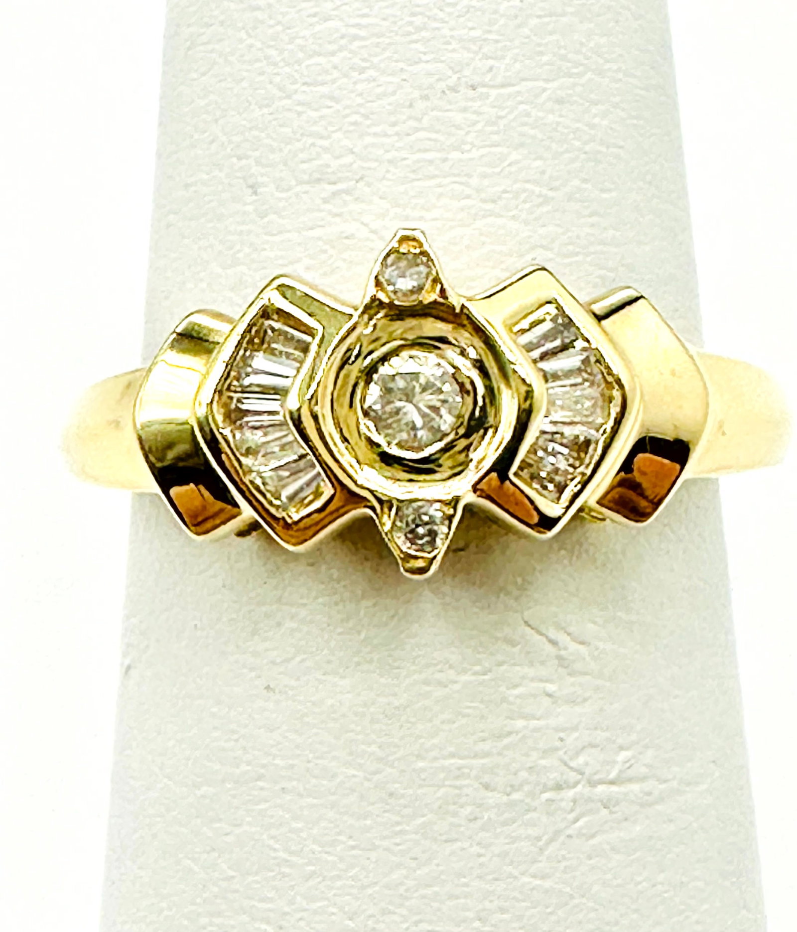 Natural Diamond Ring, 14KT Yellow Gold # 2221: # 2221 Natural Diamond Ring, 14KT Yellow Gold 13 pieces round and baguette diamond 0.20 carat(t.w.) Ring Weight: 2.50 Grams Size 5.5