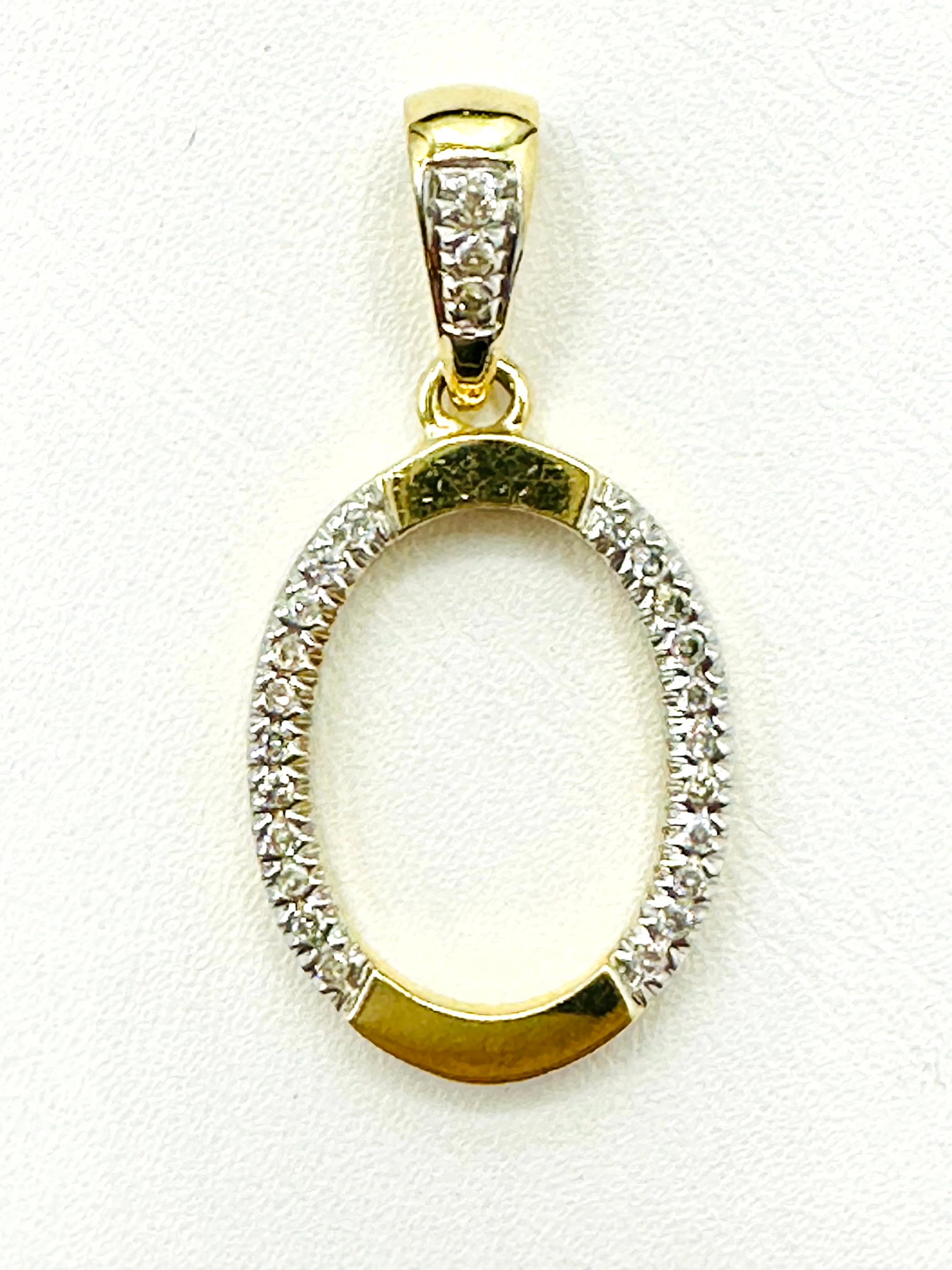 Natural Diamond Initial Pendant, 14KT Yellow Gold # 2235: # 2235 Natural Diamond Initial Pendant, 14KT Yellow Gold 25 Pieces Diamond 0.20 carat(t.w.) Pendant Weight: 2.50 grams Pendant size: 29 mm x 14.50 mm
